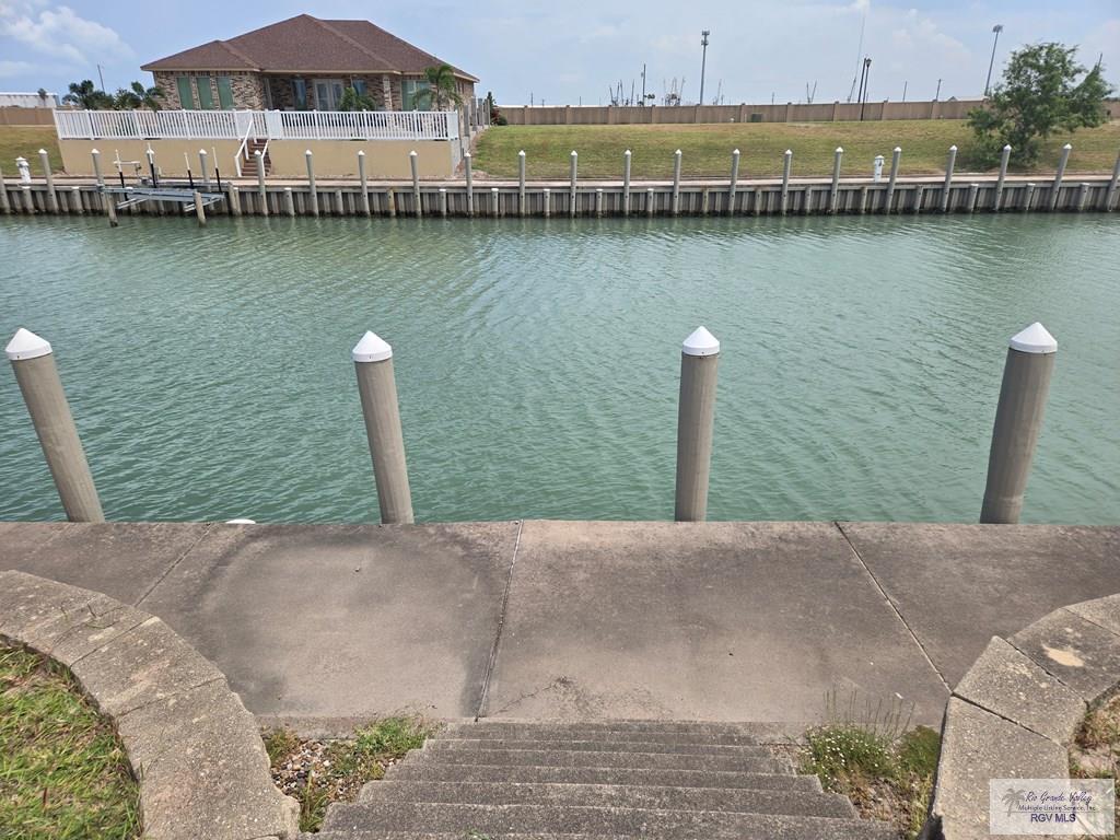 Image 4: Lot Access to Boat Dock with Bulkhead., Rear of Lot steps to boat dock.