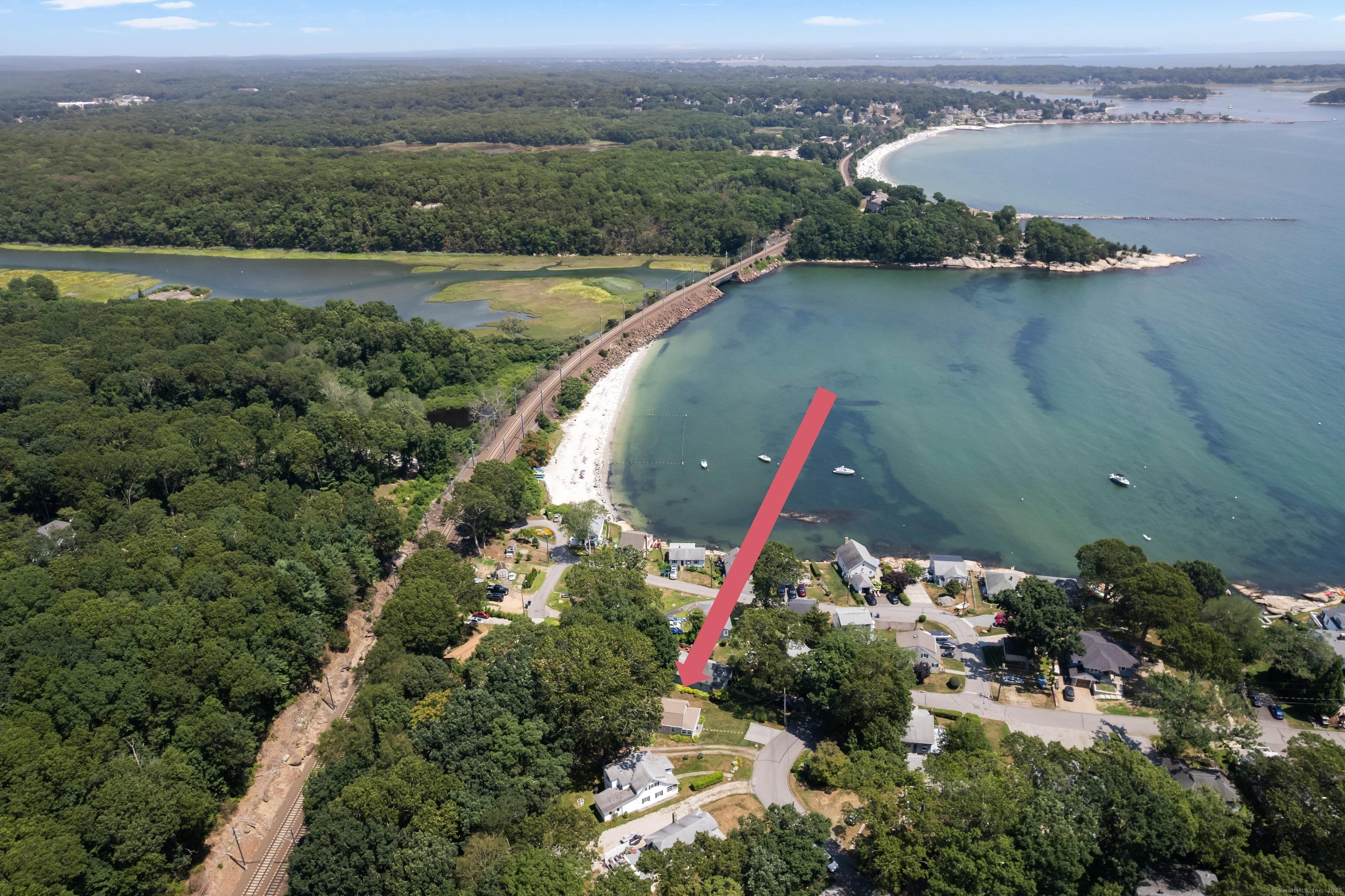 Image 2: This charming bungalow overlooks the Long Island Sound.