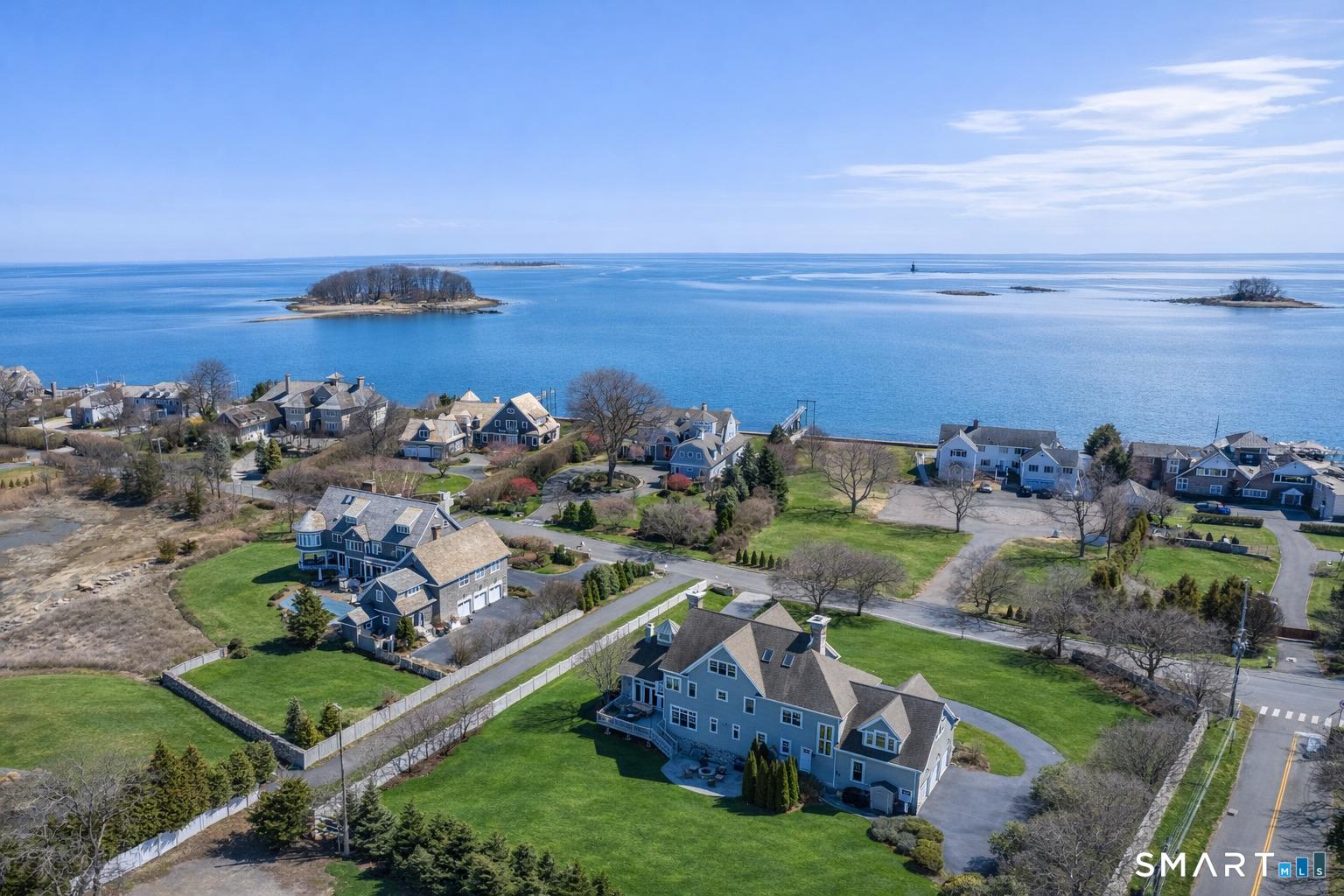 Image 1: 3 Shorehaven, on the lower right, looking out onto Long Island Sound.