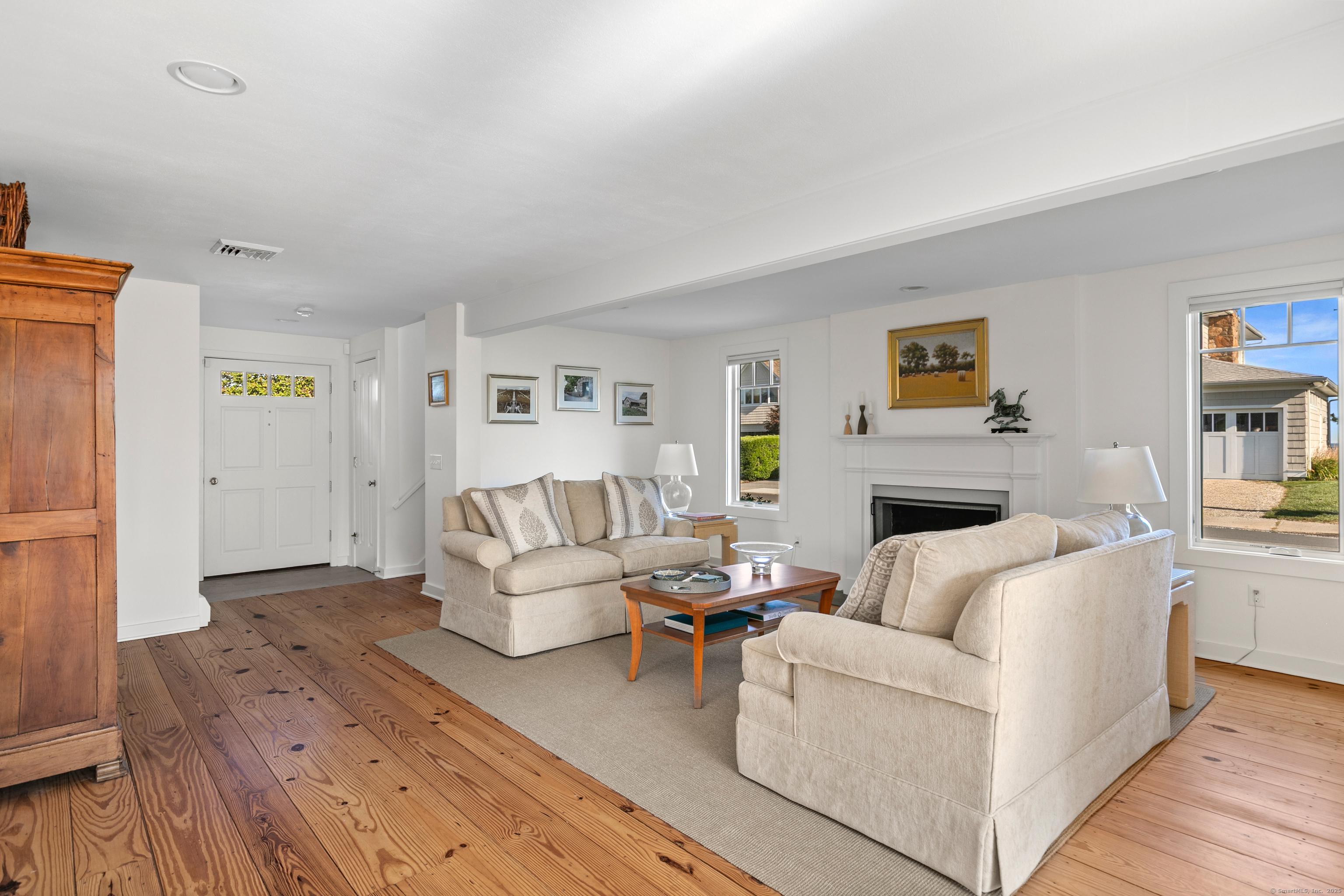 Image 4Living Room: The home has an open feel as one room leads into the next.