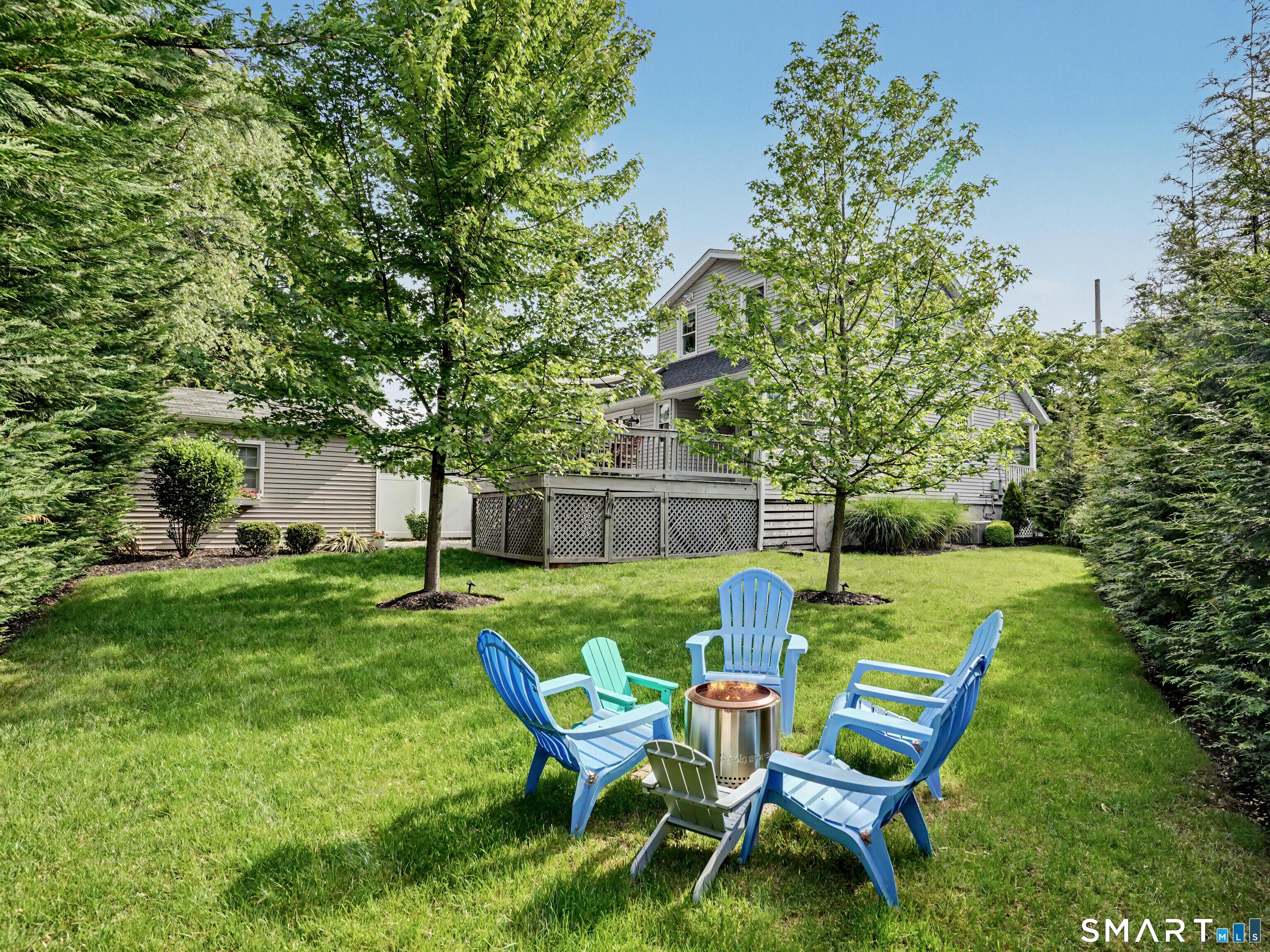 Image 2: Spacious and picturesque back yard.