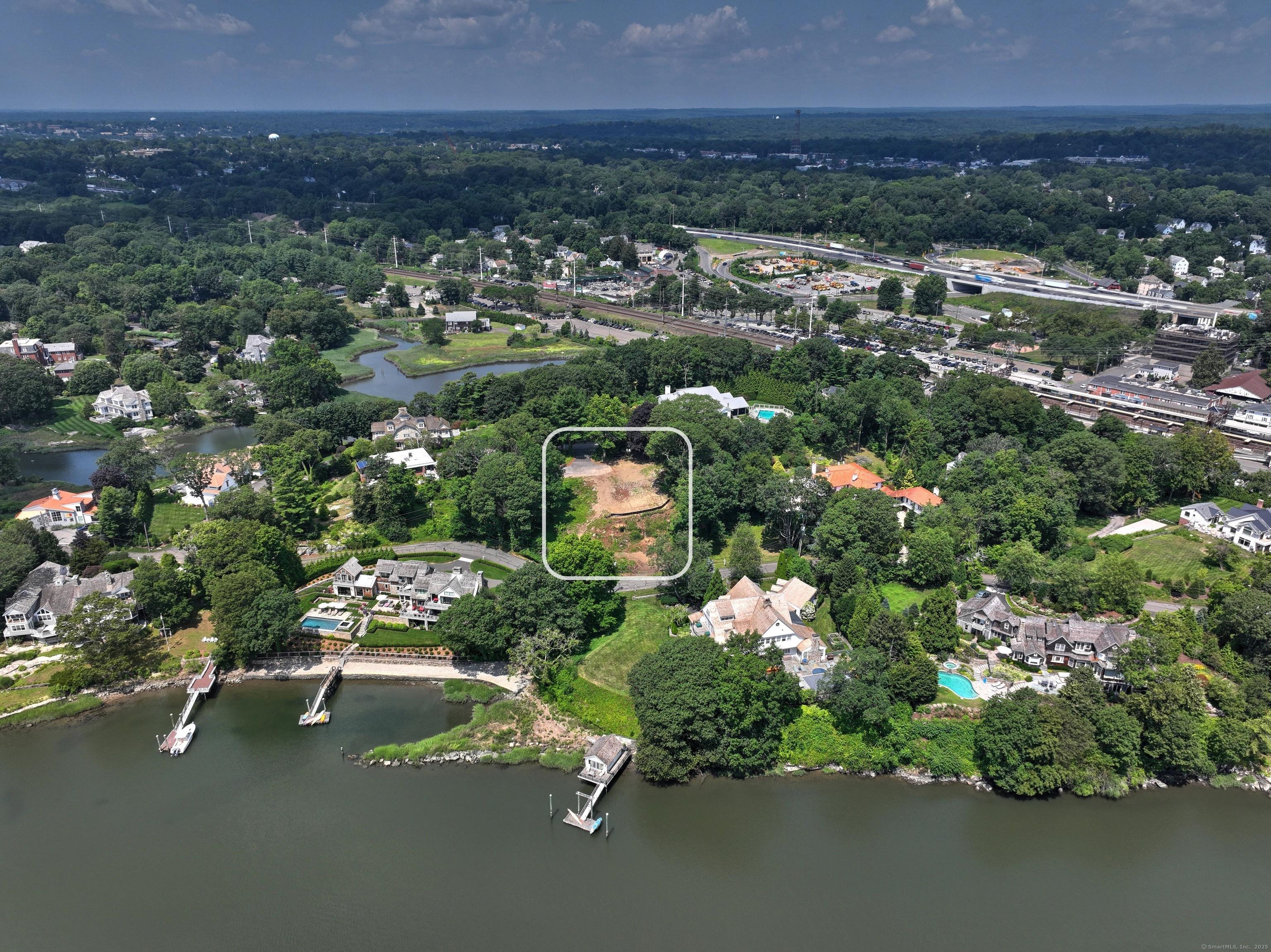 Image 4: Aerial view of lot with water views.