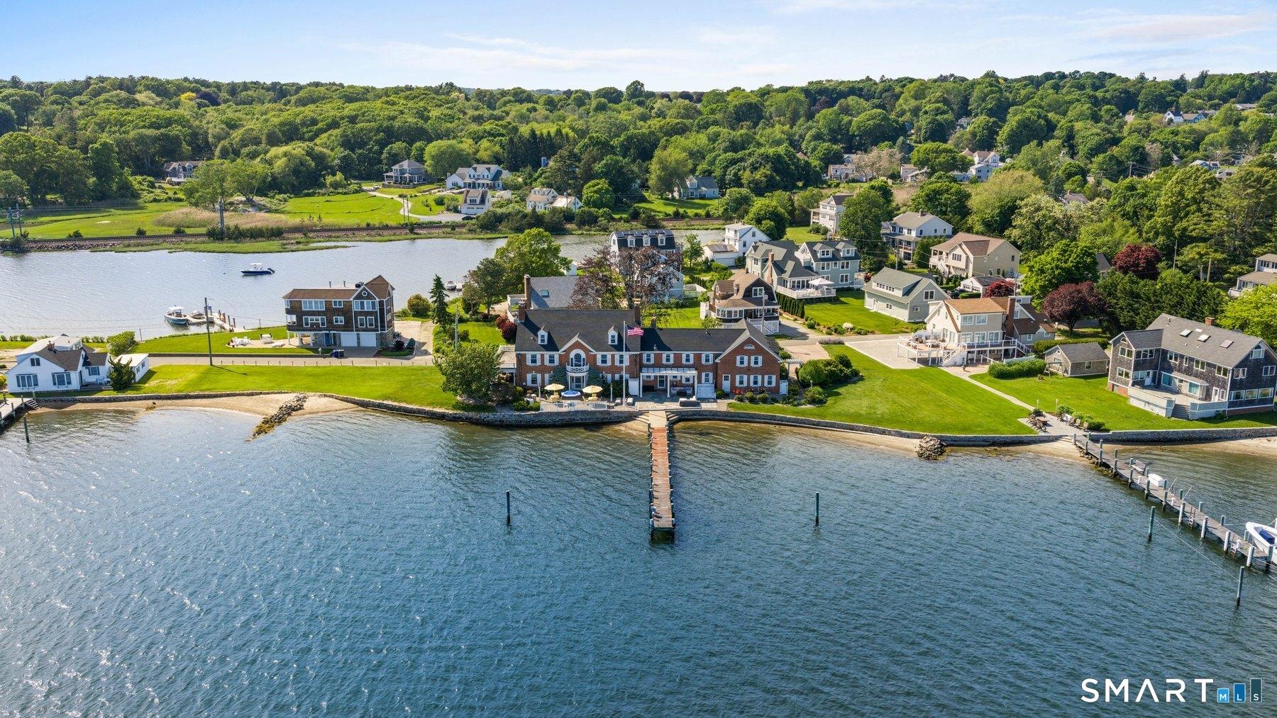 Image 1Aerial View: Aerial view of Willow Point proper, with 30 Essex Street centered along the Mystic River waterfront and its pier extending from shore.
