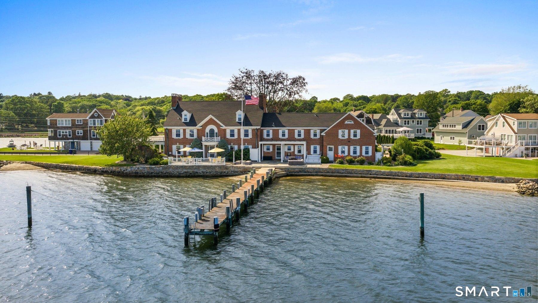 Image 3Waterfront: 30 Essex St with a beach, 120' pier, and approximately 356' of waterfront. At high tide, there is approximately 5' of water at the end of the pier; at low tide, approximately 3'.