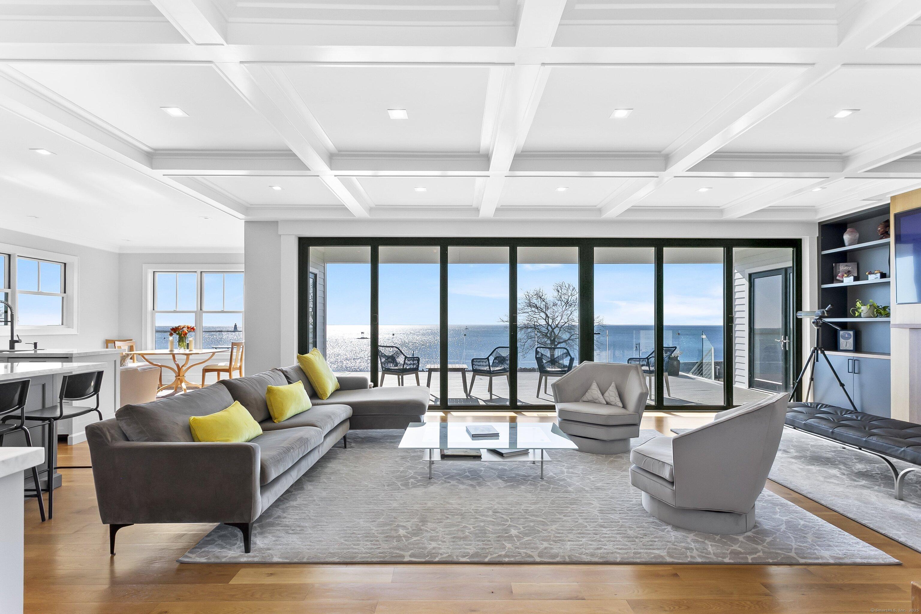 Image 4: Family room and all rooms with gorgeous water views.