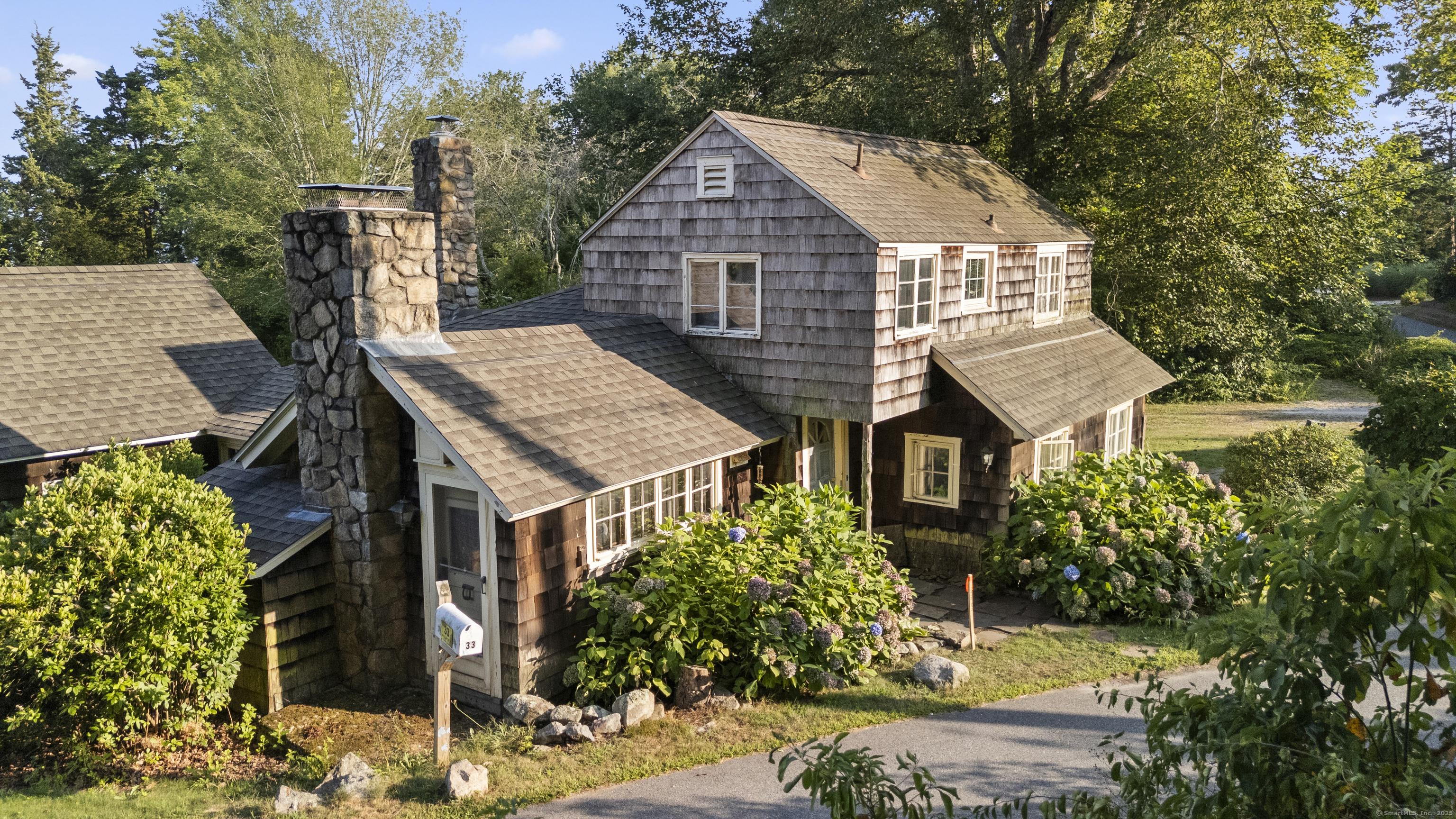Image 2: Three Bedroom, Two and One Half Bath Charming Cottage.