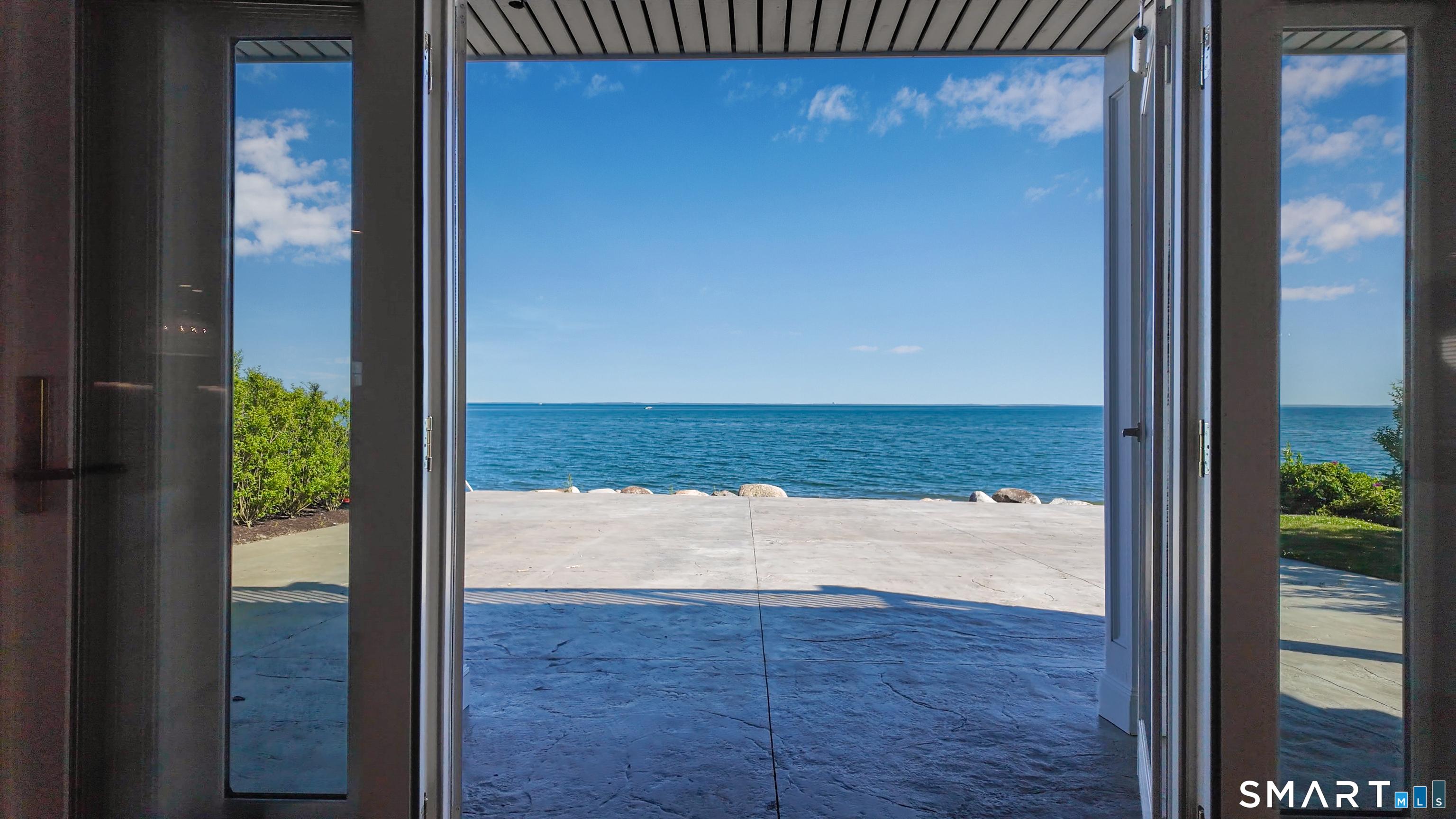 Image 3: NO STEPS from your living roomto your beautiful patio and water. Wonderful water access for swimming, kayaking, paddle boarding.....