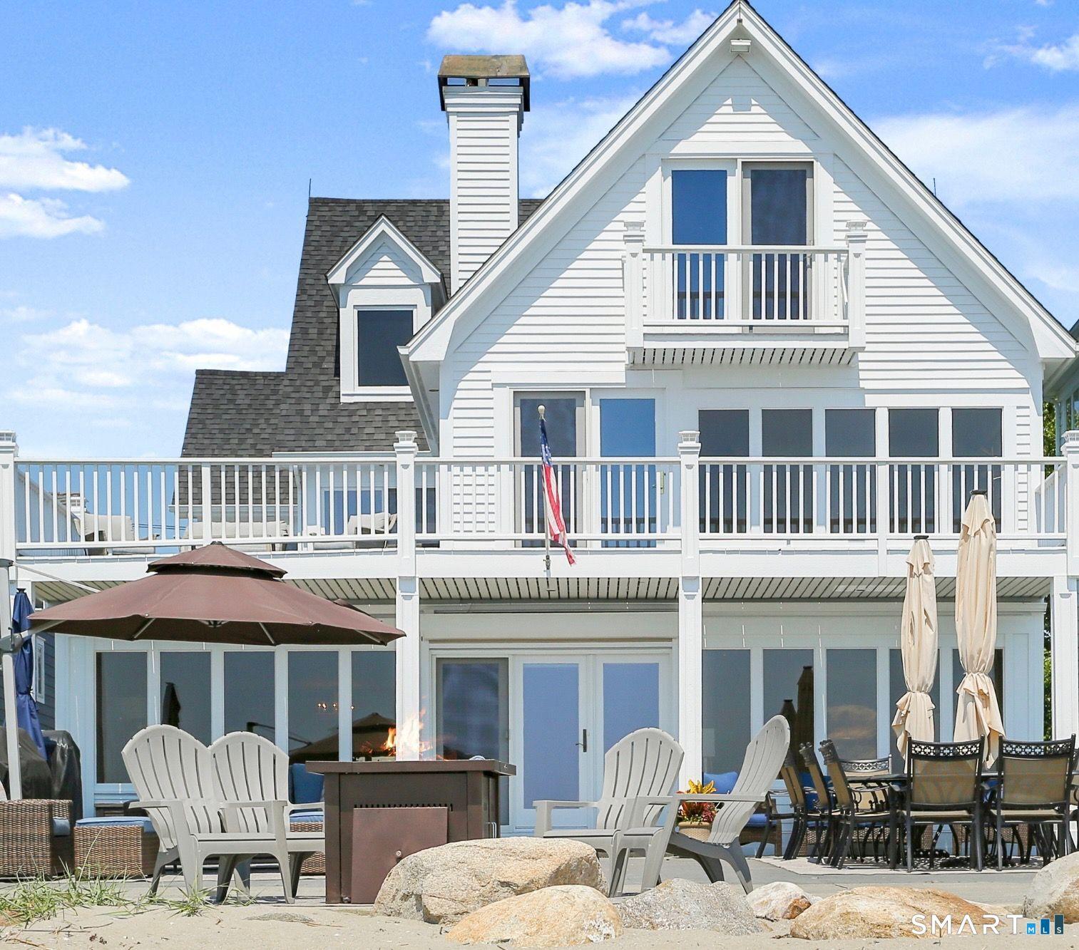 Image 4: Toes in the sand just outside of your french doors...... and NO STEPS to your expansive patio leading to your very own Beach ALL ready for the summer......with just as much indoor space to enjoy as outdoor