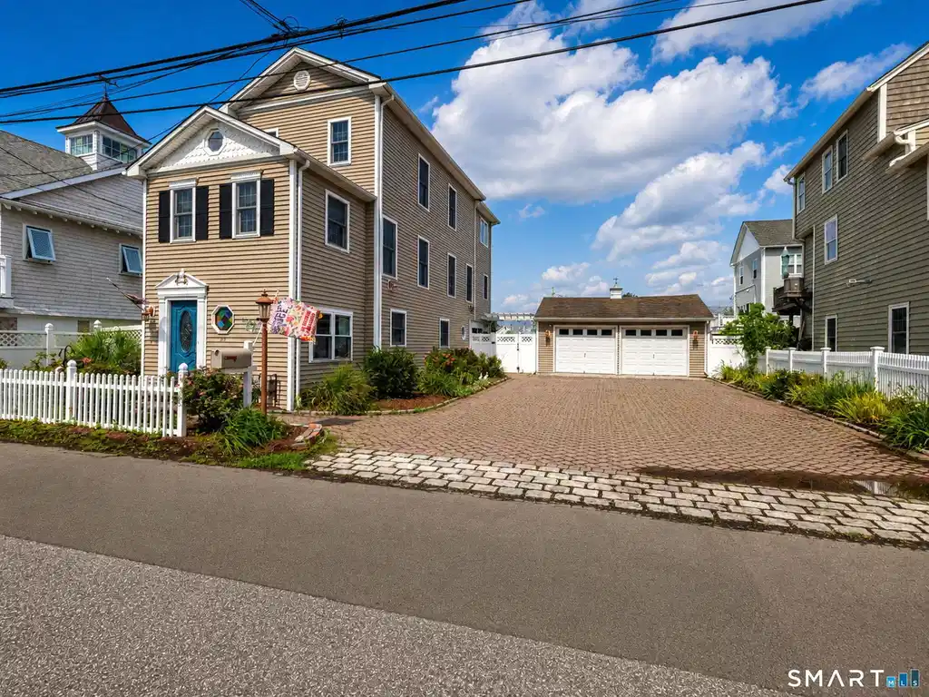 Image 1: Amazing Colonial on an oversized lot with a two car garage and parking for an additional nine cars!