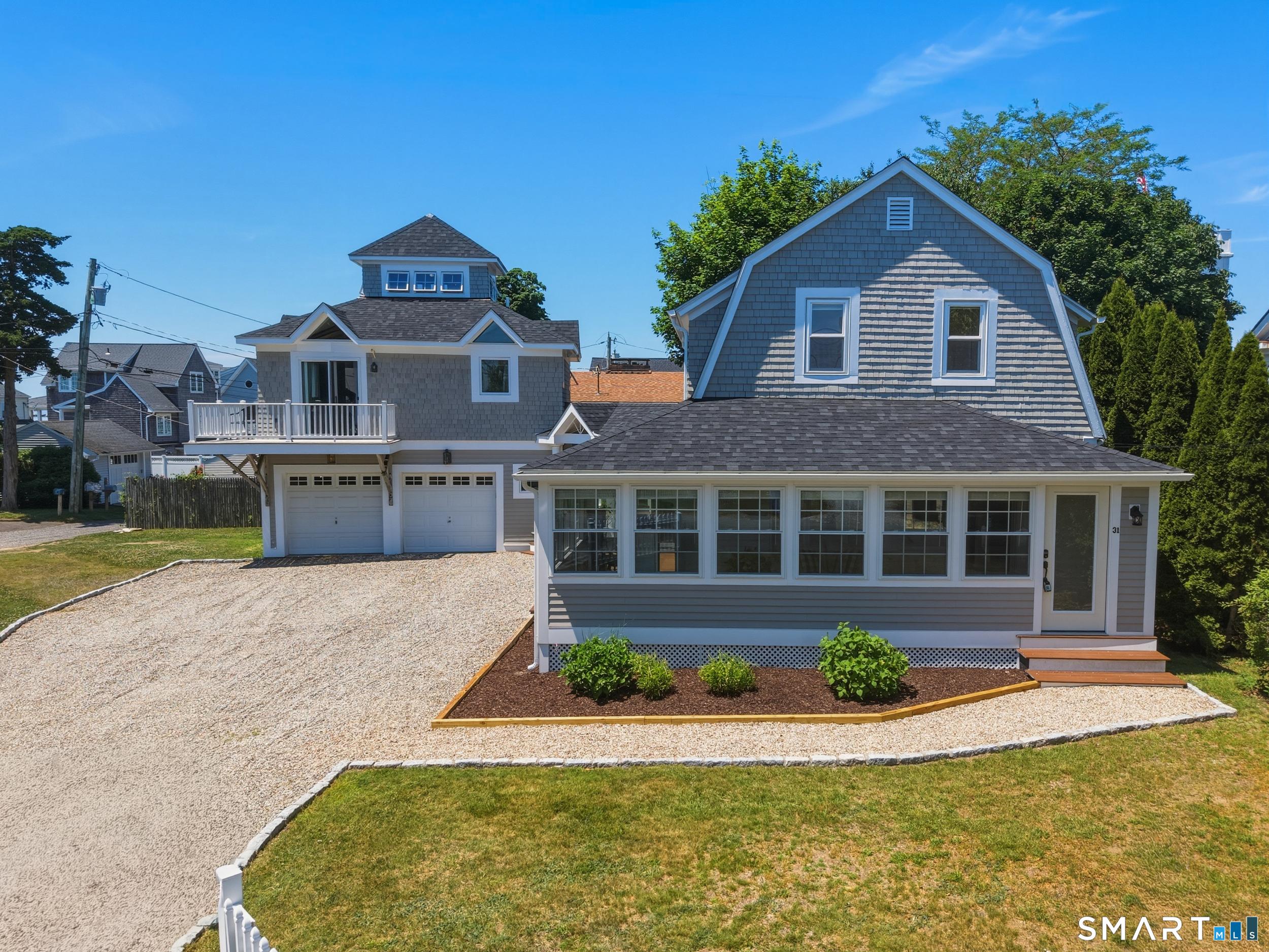 Image 3Front of House: Recent updates include new roof, energy-efficient HVAC, tankless hot water, and fresh interior/exterior paint. The detached 2-car garage includes an efficiency apartment above; perfect for guests, private office space, studio, or rental income.