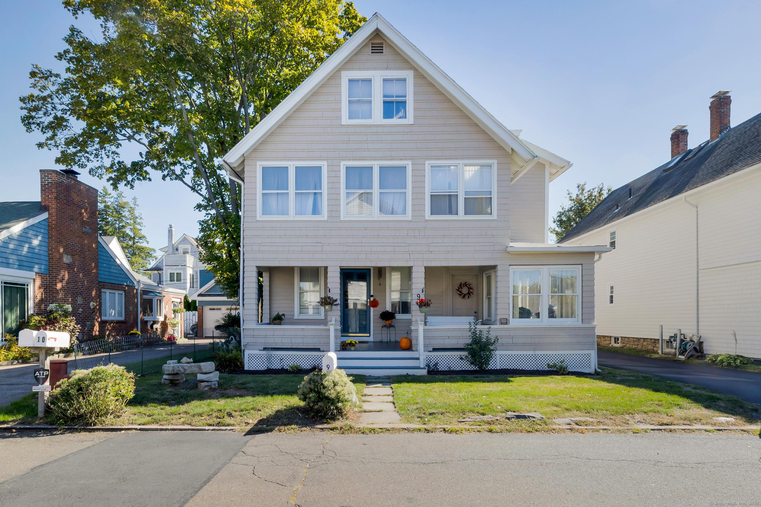Image 3Front of House: Circa 1905 ~ Enjoy water views, mooring rights, and beach rights through the coveted Pine Orchard Association.