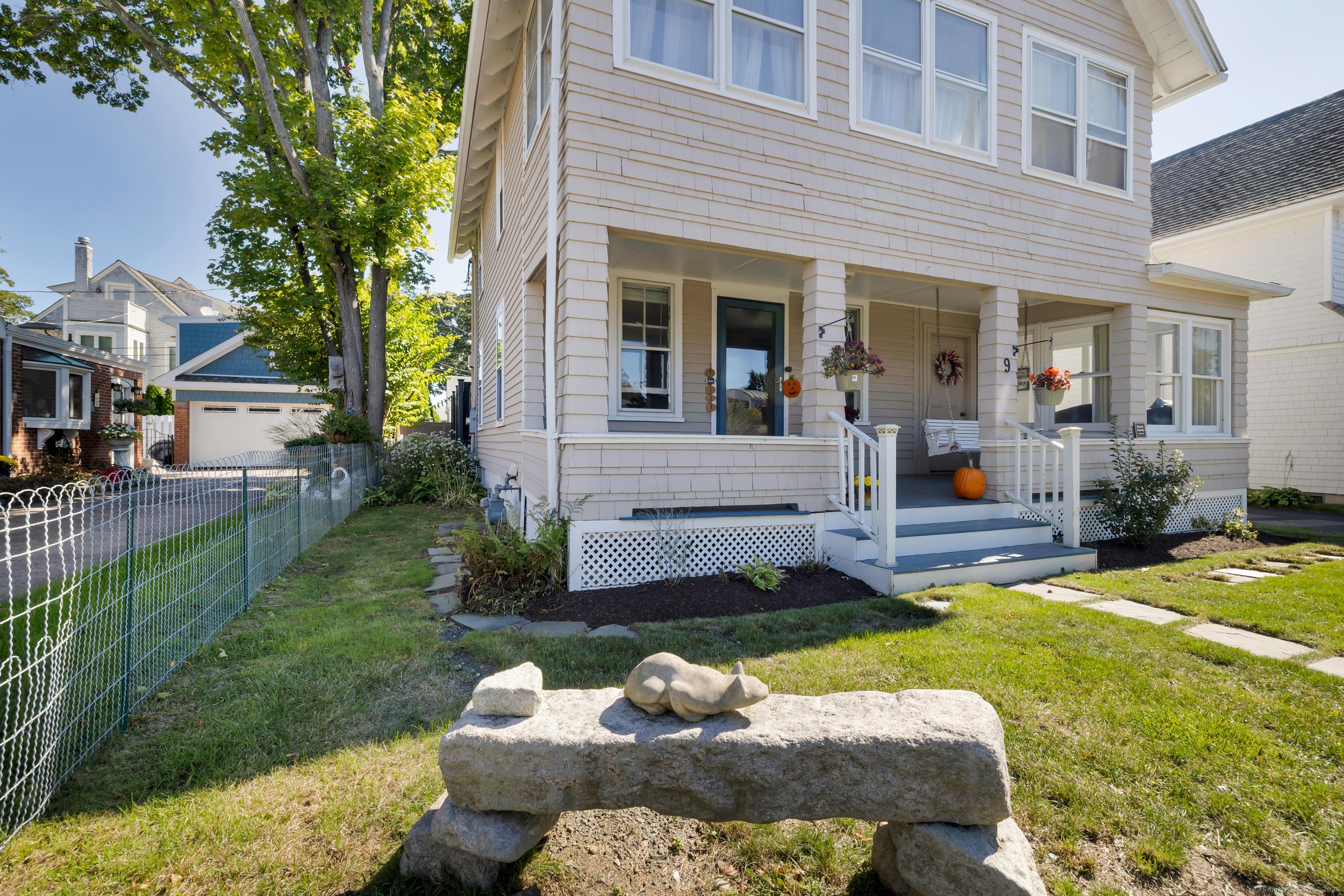 Image 4Yard: Lovely curb appeal, quintessential beach home, sits on a .09-acre level lot.