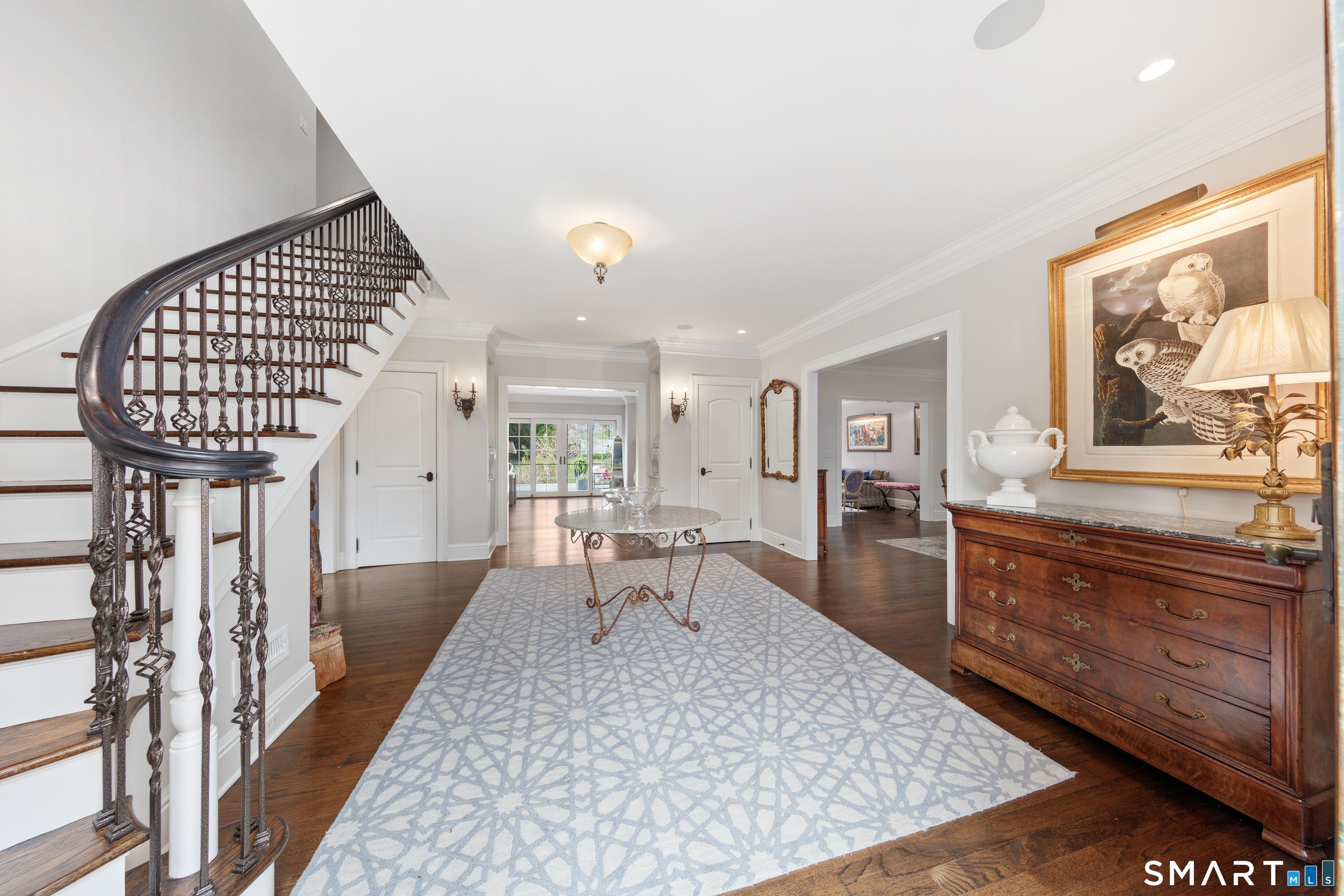 Image 3Foyer: Gracious Entry Foyer looking to Living Room and backyard