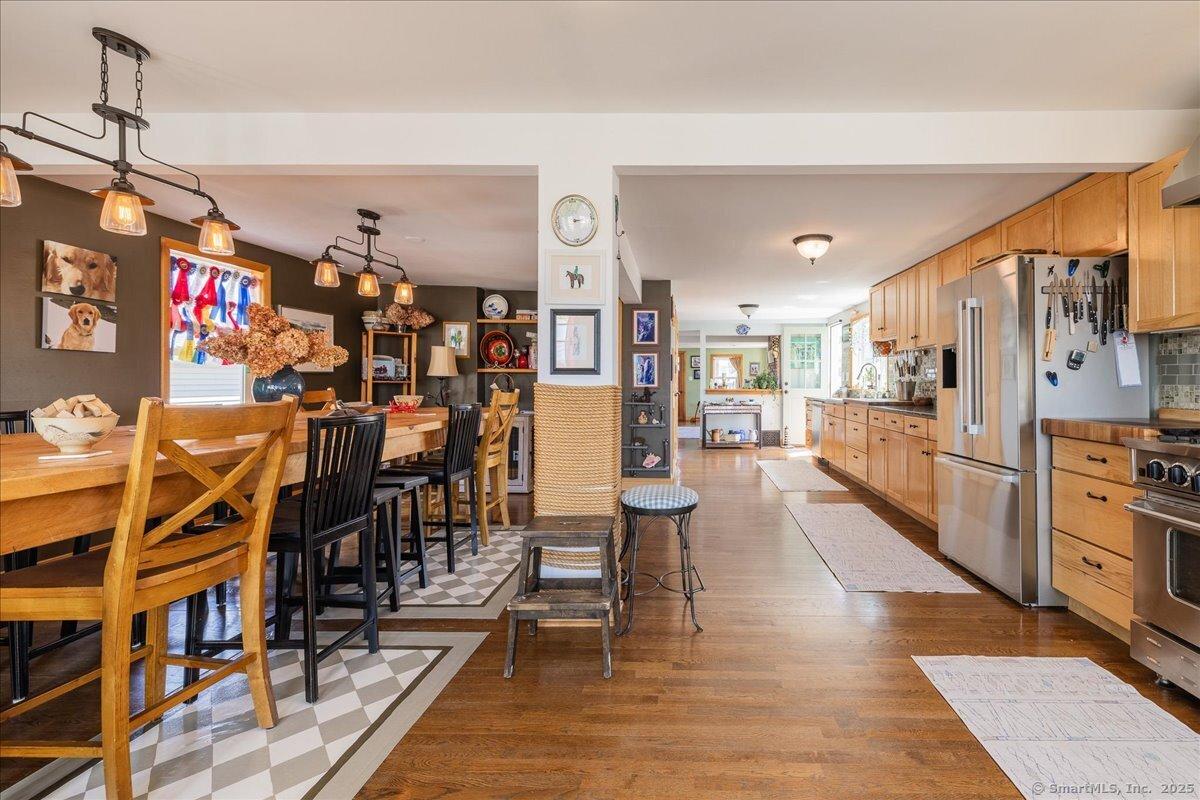 Image 2Kitchen: This space is an open floor plan containing the kitchen, dining area and plenty of open floor space.