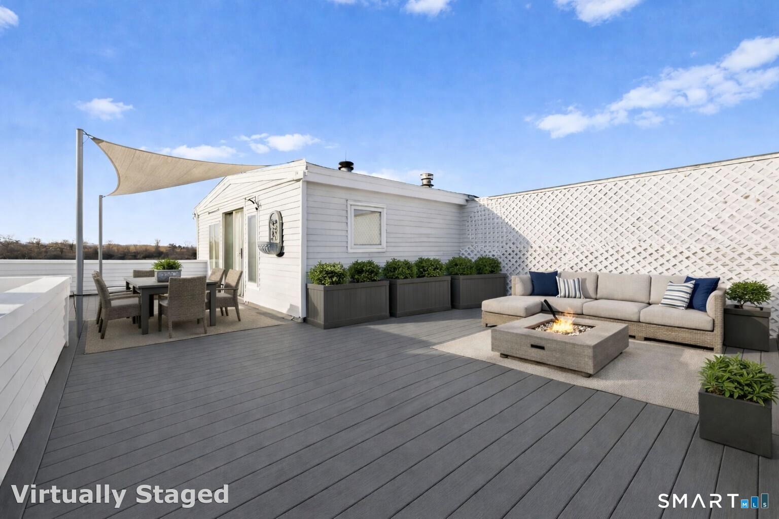 Image 3: Rooftop Deck with Panoramic Water Views