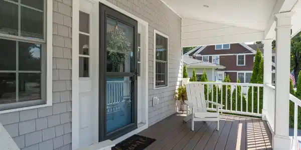 Image 4: The front provides ample space to meet your guests or watch neighbors walk by.