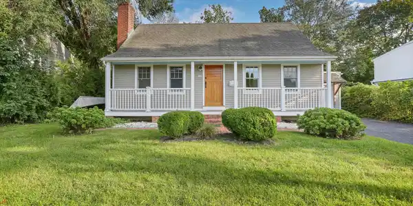 Image 2: This charming front porch adds character and detail