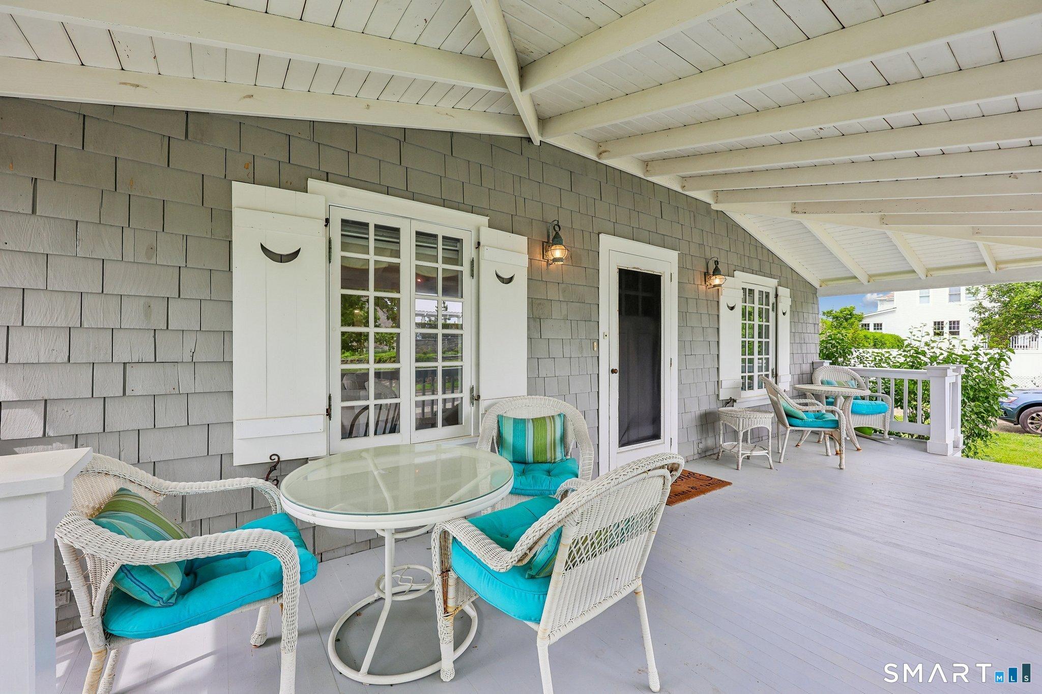 Image 3: Relax on the large front porch and feel the breezes from Long Island Sound