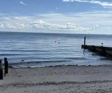 Image 3Waterfront: View from the private beachfront to the Southwest.
