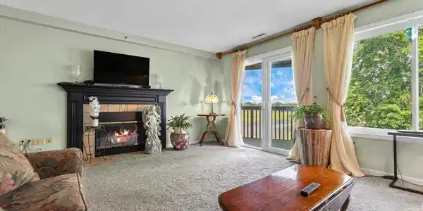 Image 2Living Room: In the living room you will find a wood burning fireplace to keep you cozy and warm in the cooler weather.