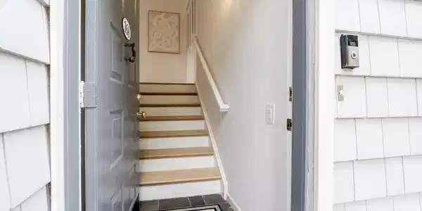 Image 2Main Entry: Enter up steps to Ranch-style living in this freshly painted, updated 3 Bedroom/2 Bath spacious condo at Rowayton Woods!