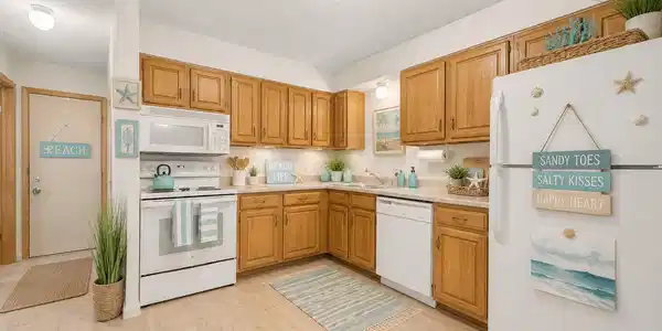 Image 3: Beach-inspired Kitchen is open to dining area and living room - it is perfect for entertaining!