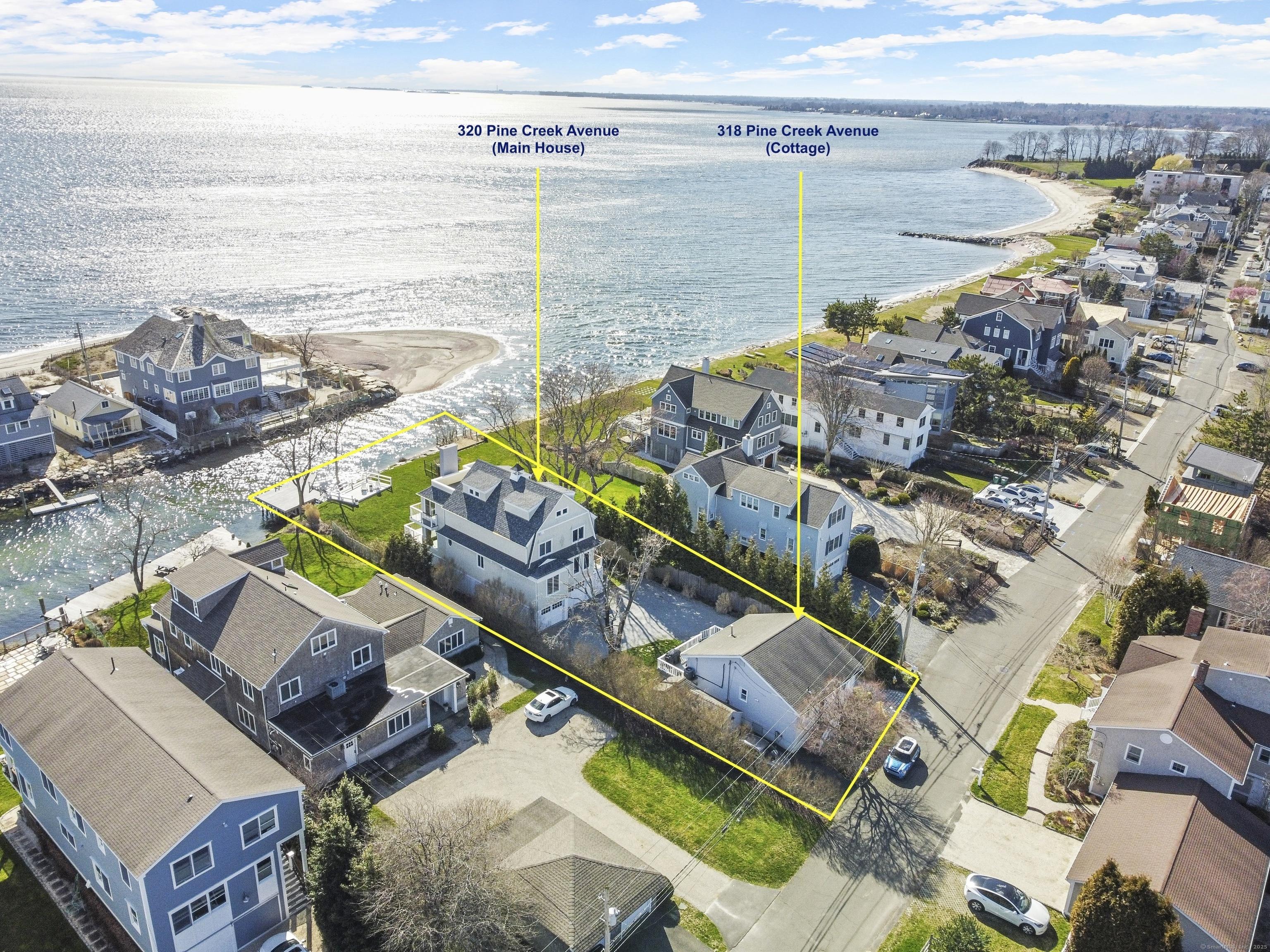 Image 1: 318 & 320 Pine Creek Avenue - The main house, completely rebuilt in 2018 and fully FEMA compliant, is light filled & direct water front with amazing views. The separate cottage offers additional living space or an excellent investment opportunity.