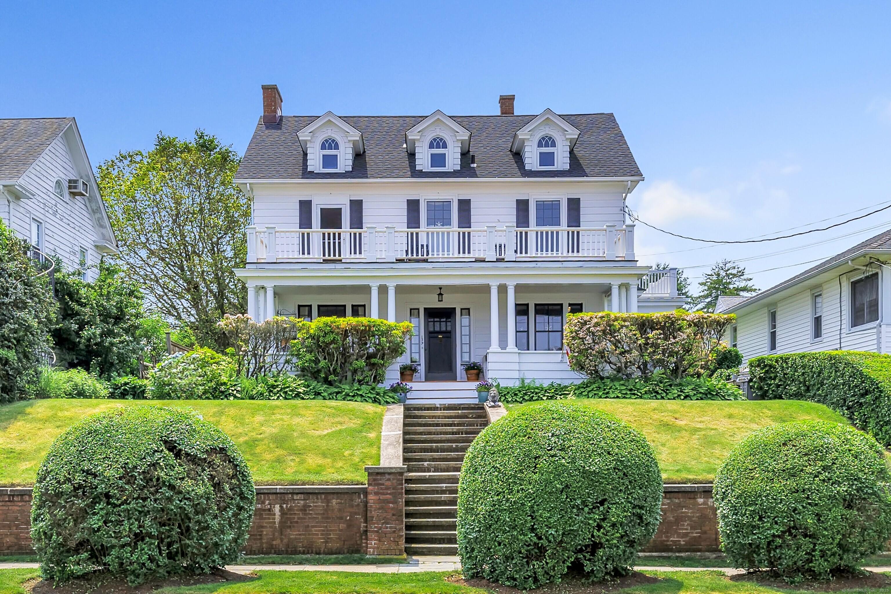 Image 3: The updated main house faces the harbor.
