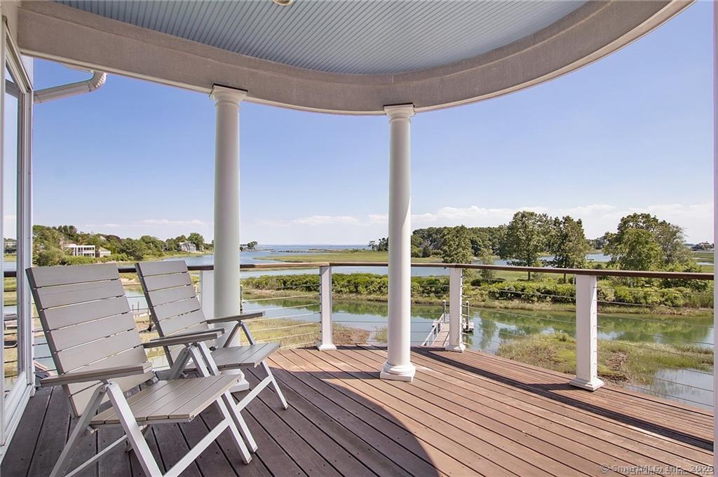 Image 3: Nestled at the end of a cul de sac, this gracious home offers ultimate privacy