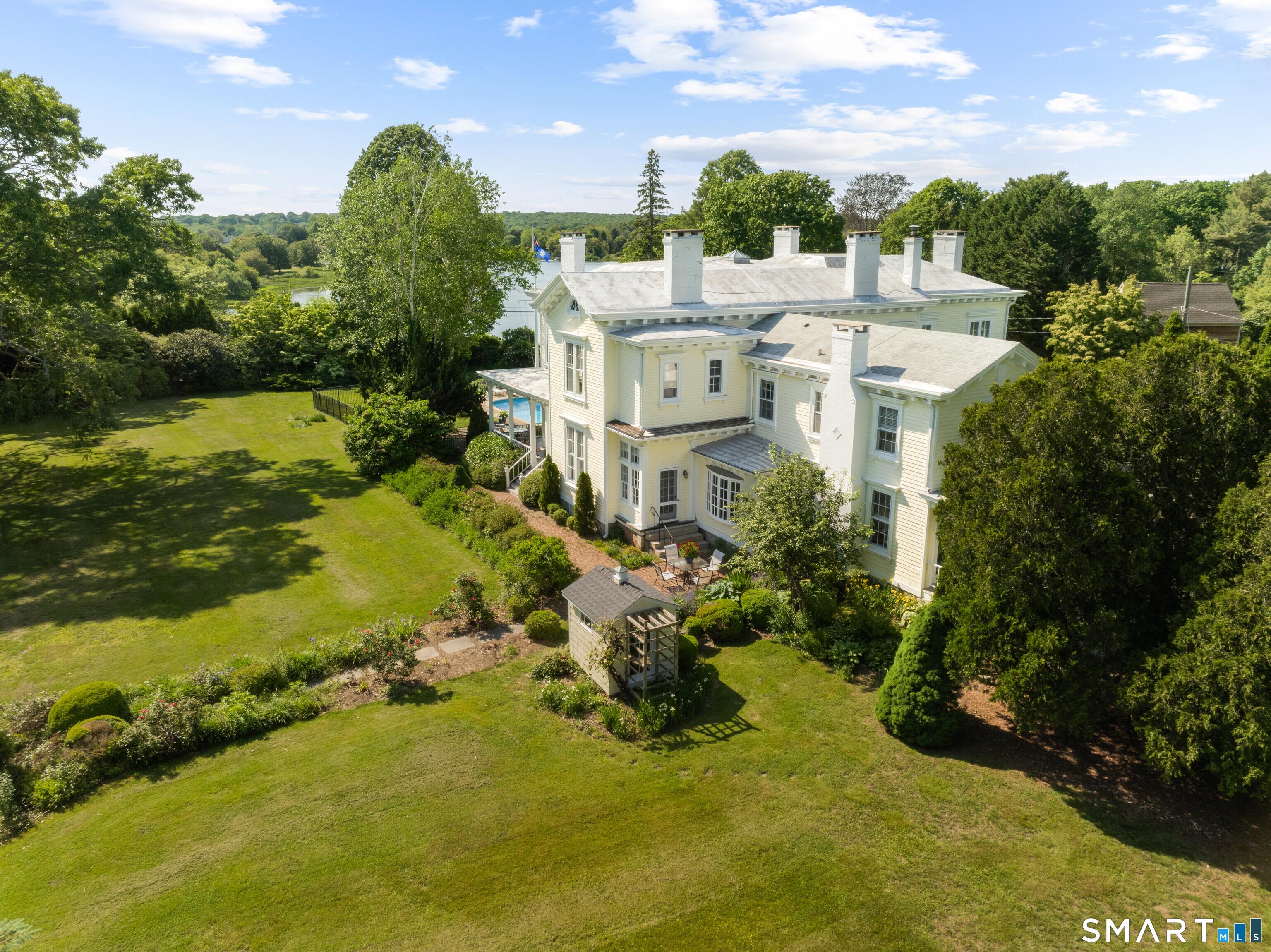 Image 1: Cove Lawn - Stonington Estate nestled on 3.9 manicured acres. Primary home, guest cottage and barn-garage.