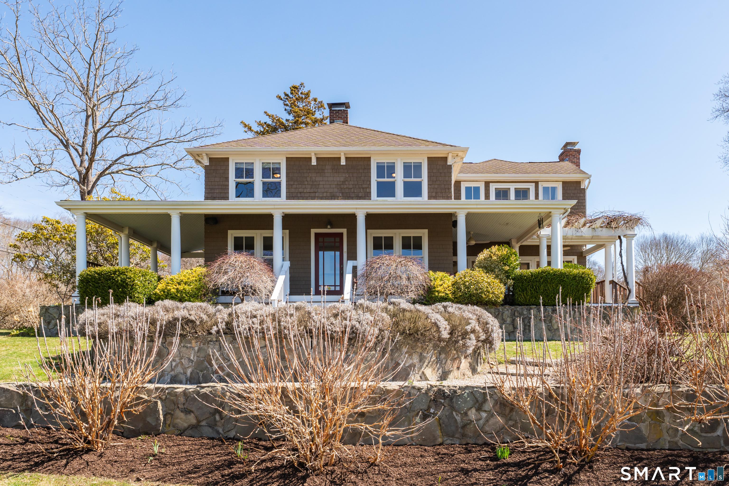 Image 4: This reimagined antique farmhouse was extensively renovated including soaring ceiling heights, and modern luxuries while maintaining the charm.