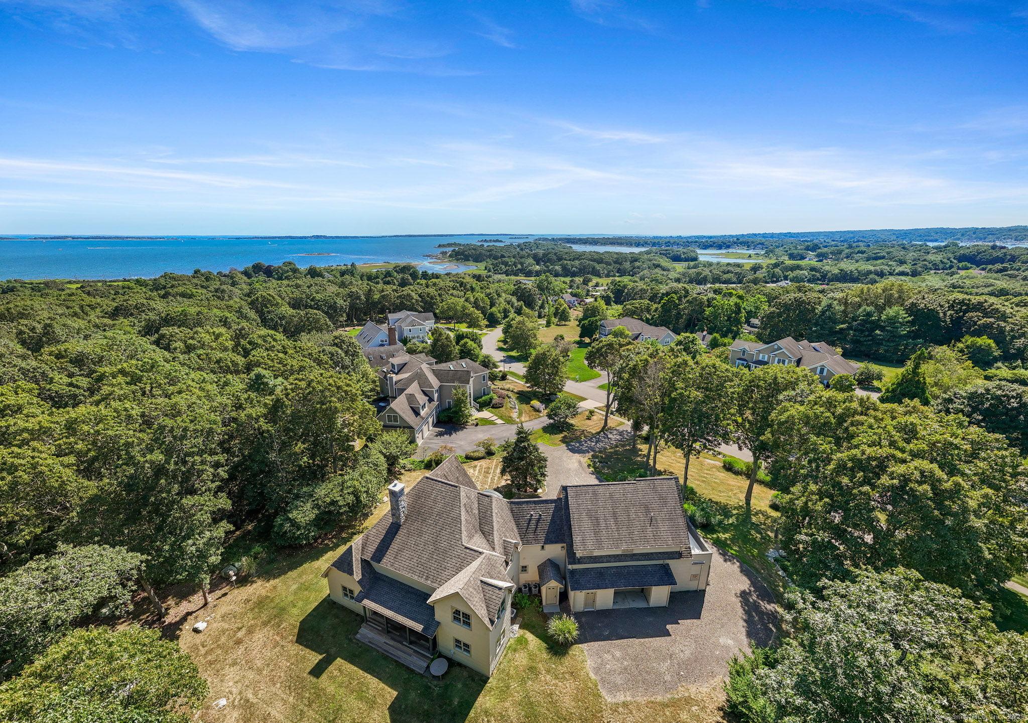 Image 3: Aerial view with Fishers Island sound in the background. Waterviews are visible from second floor.