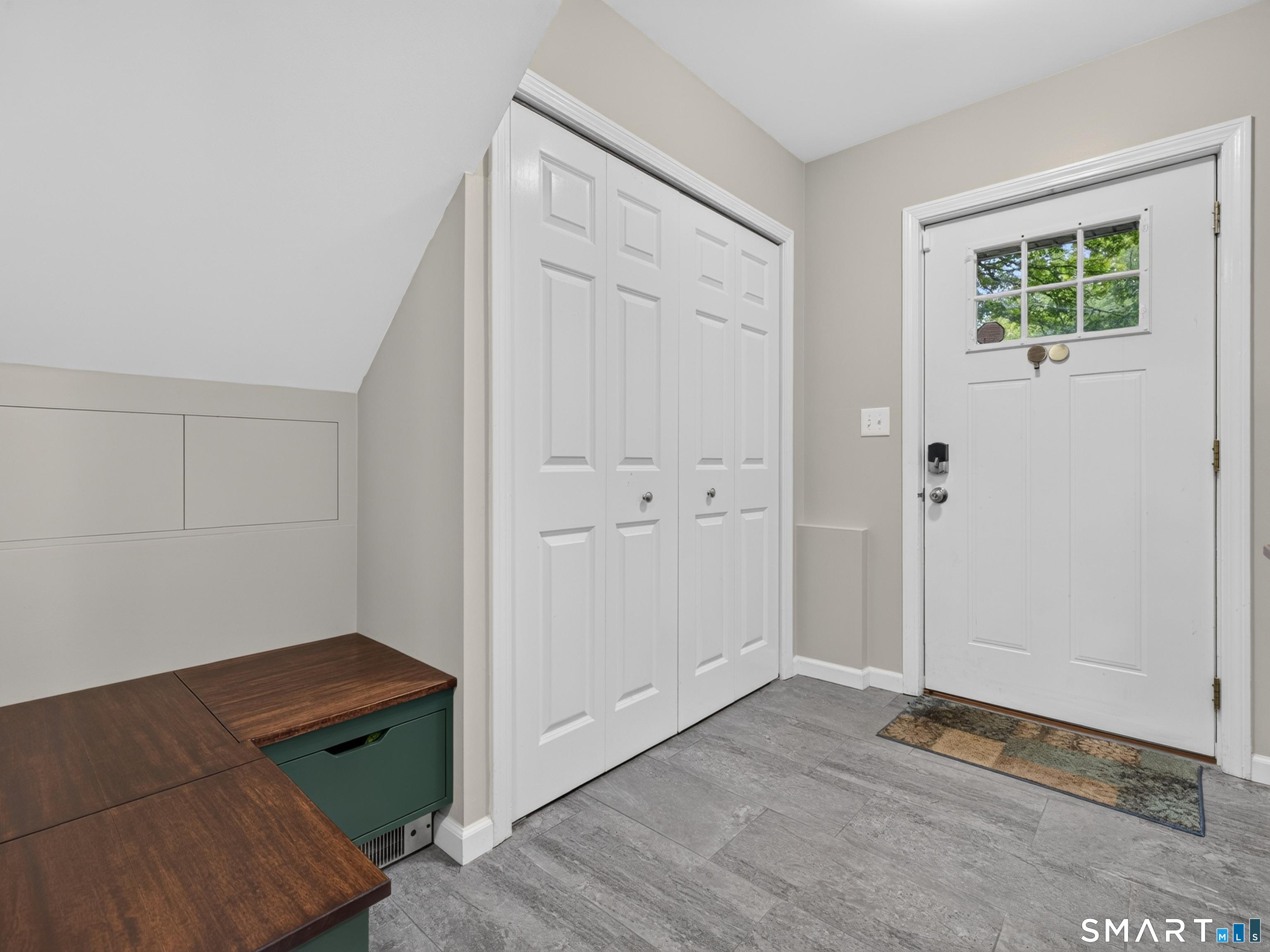 Image 3: Enter the foyer with built in storage