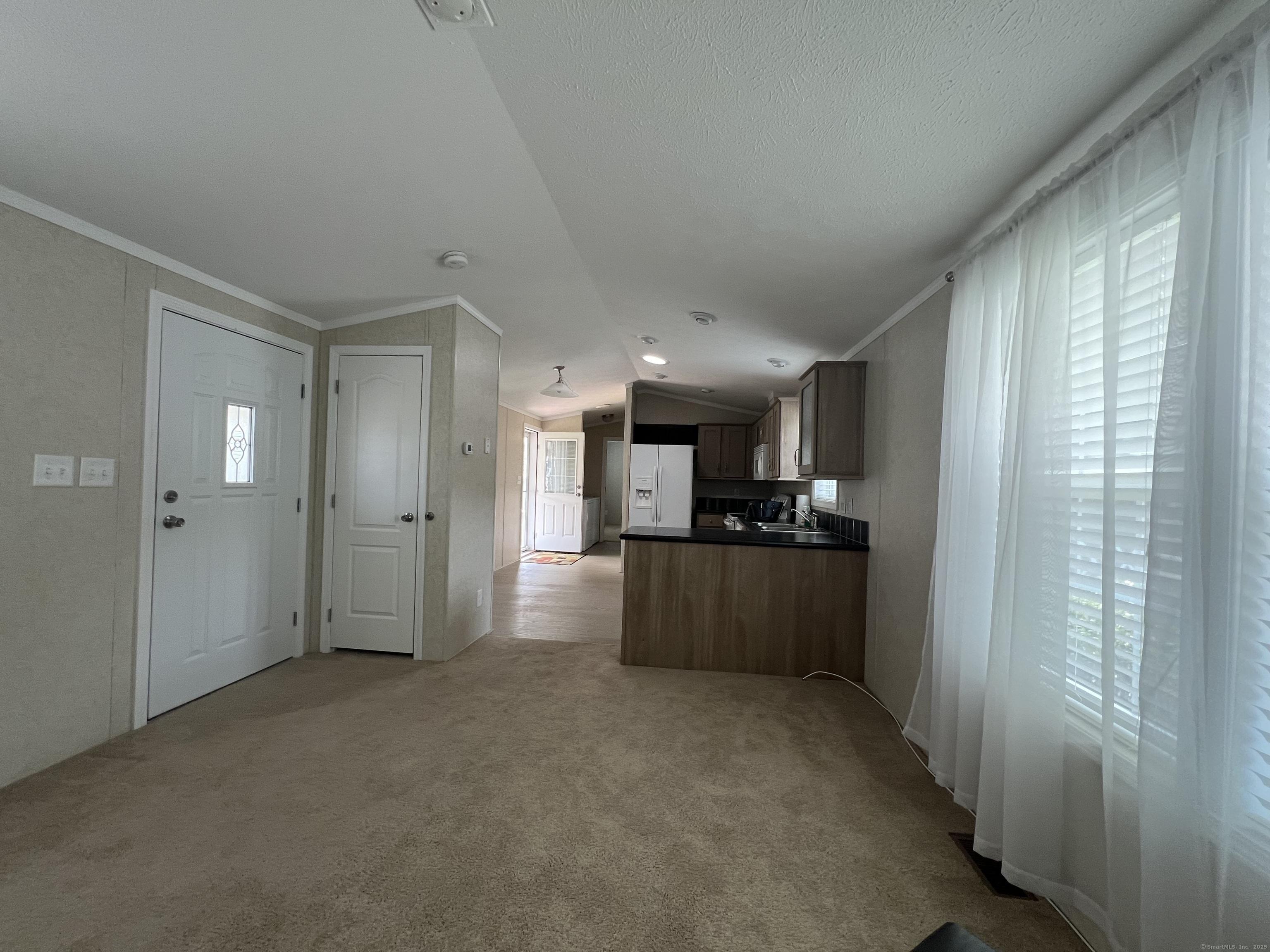 Image 2: Nice open space with plenty of windows.