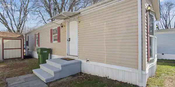 Image 3: Your entry. You have a parking spot directly next to the home, and a second spot at the end of Cook Terrace