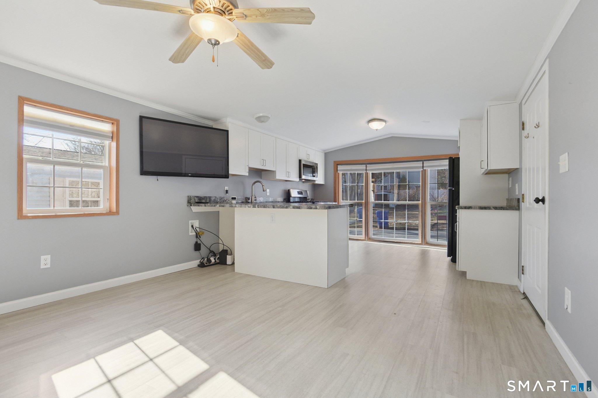 Image 4: New luxury vinyl flooring and a new kitchen!