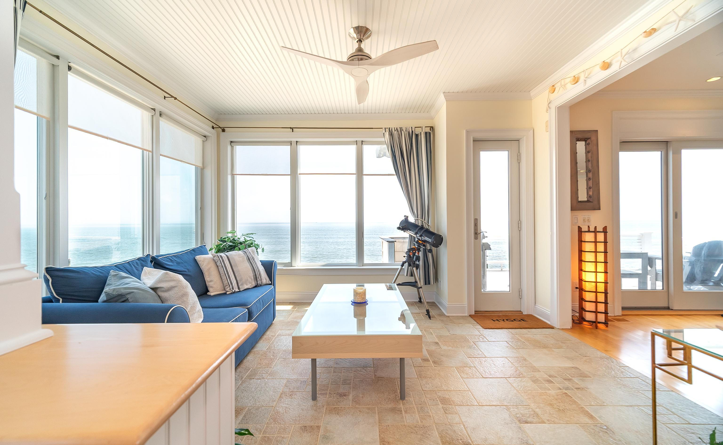Image 4: Sitting area with radiant in-floor heating and waterviews.