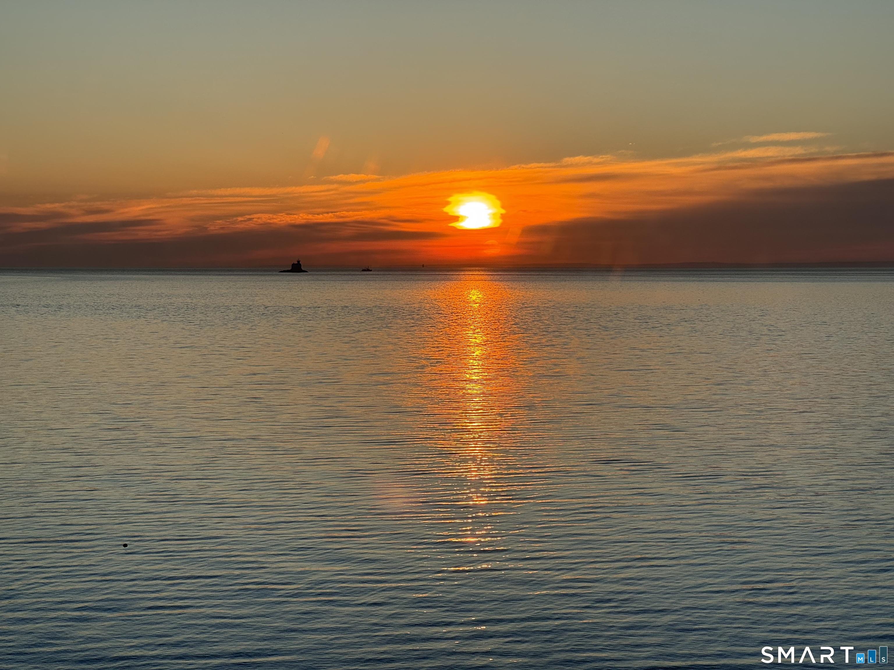 Image 1View: Sunrise. The waterfront view from inside the house.