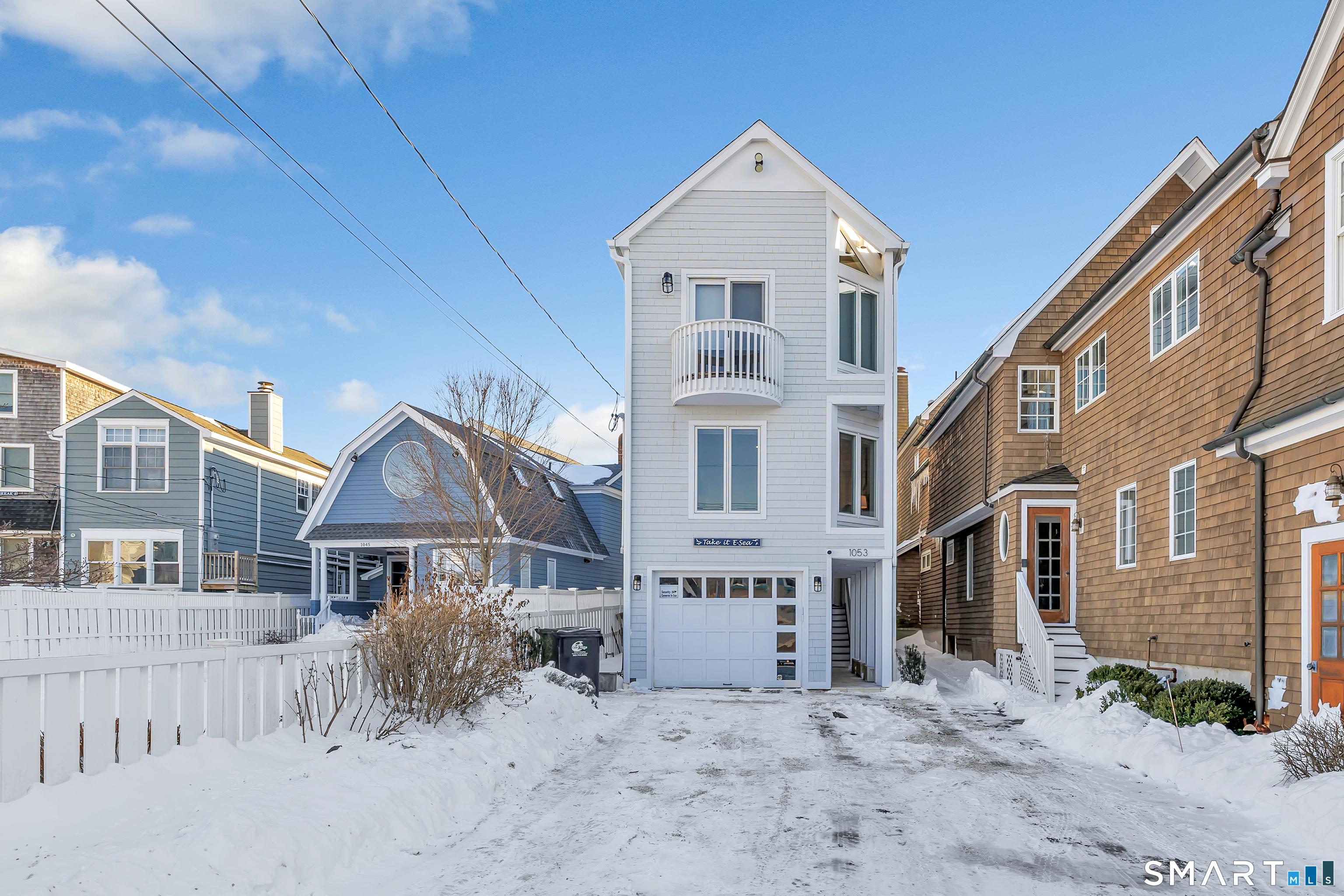 Image 2Front of House: Extra deep driveway for 8+ cars