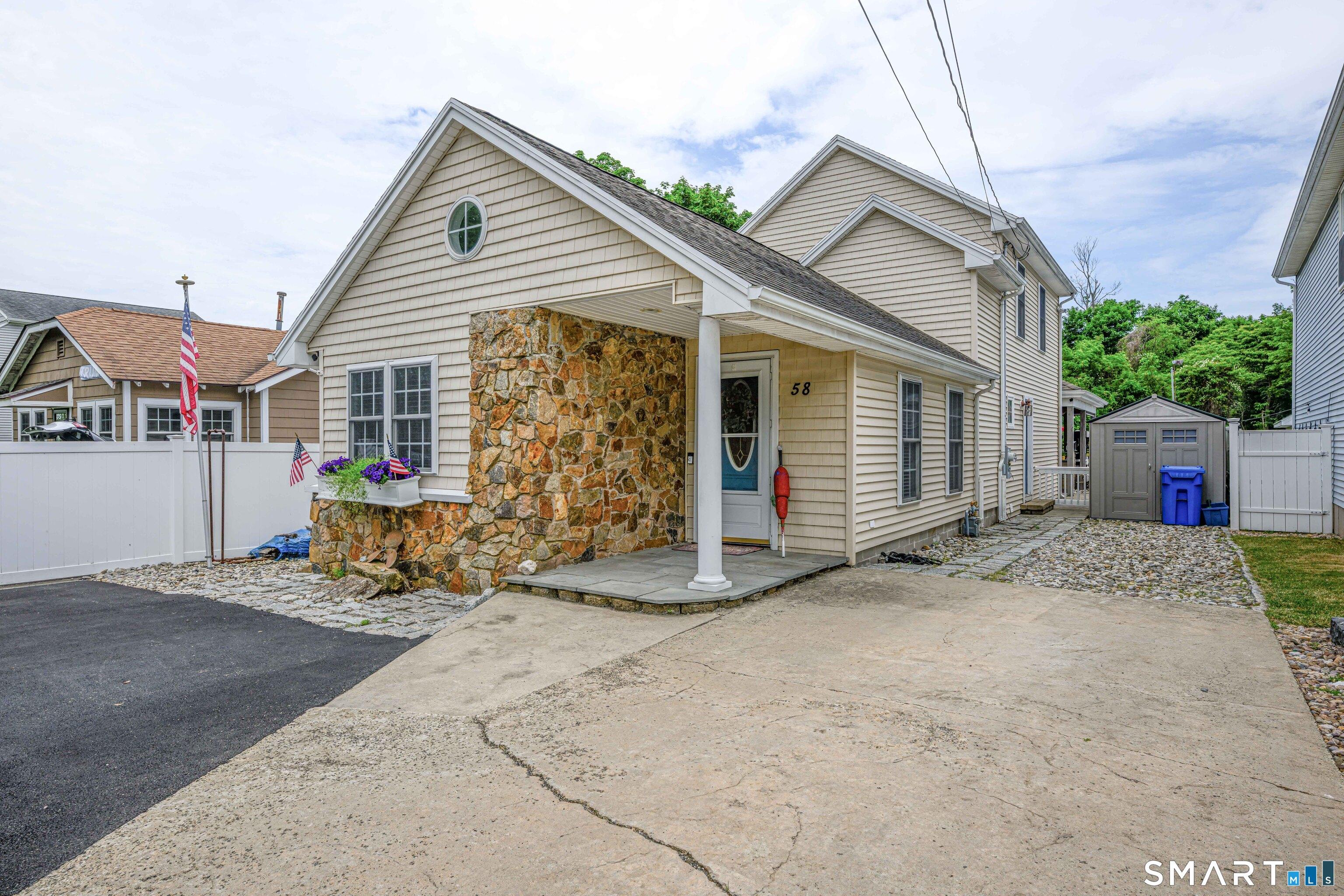 Image 1Front of House: Plenty of parking for family gatherings.
