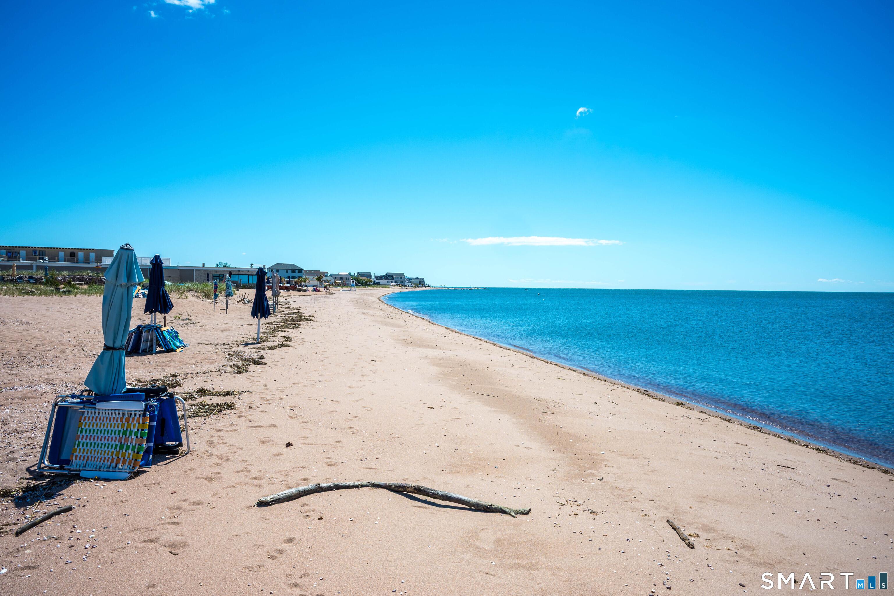 Image 4: Setup your umbrella and chairs for the summer! Silver Sands Beach Club is just a hop, skip, and a jump down the beach