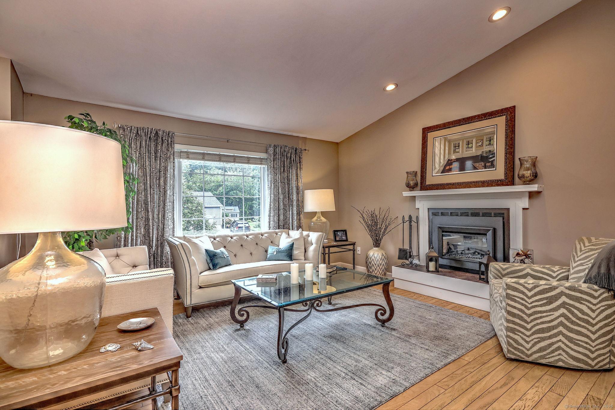 Image 4: FORMAL LIVING ROOM W FIREPLACE