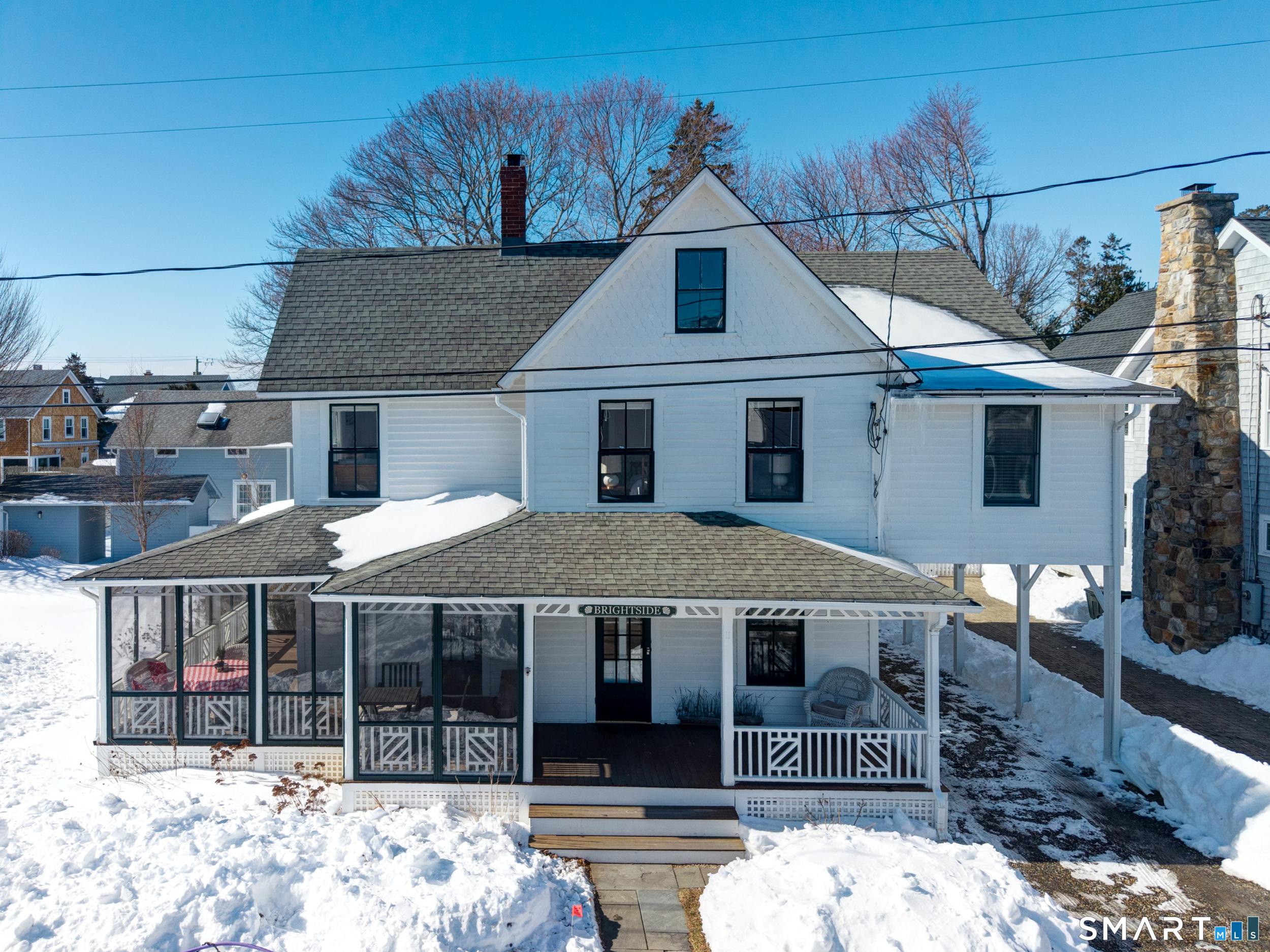 Image 1Front of House: WELCOME HOME... "Brightside" offers four bedrooms and two full baths in this quintessential beach house.