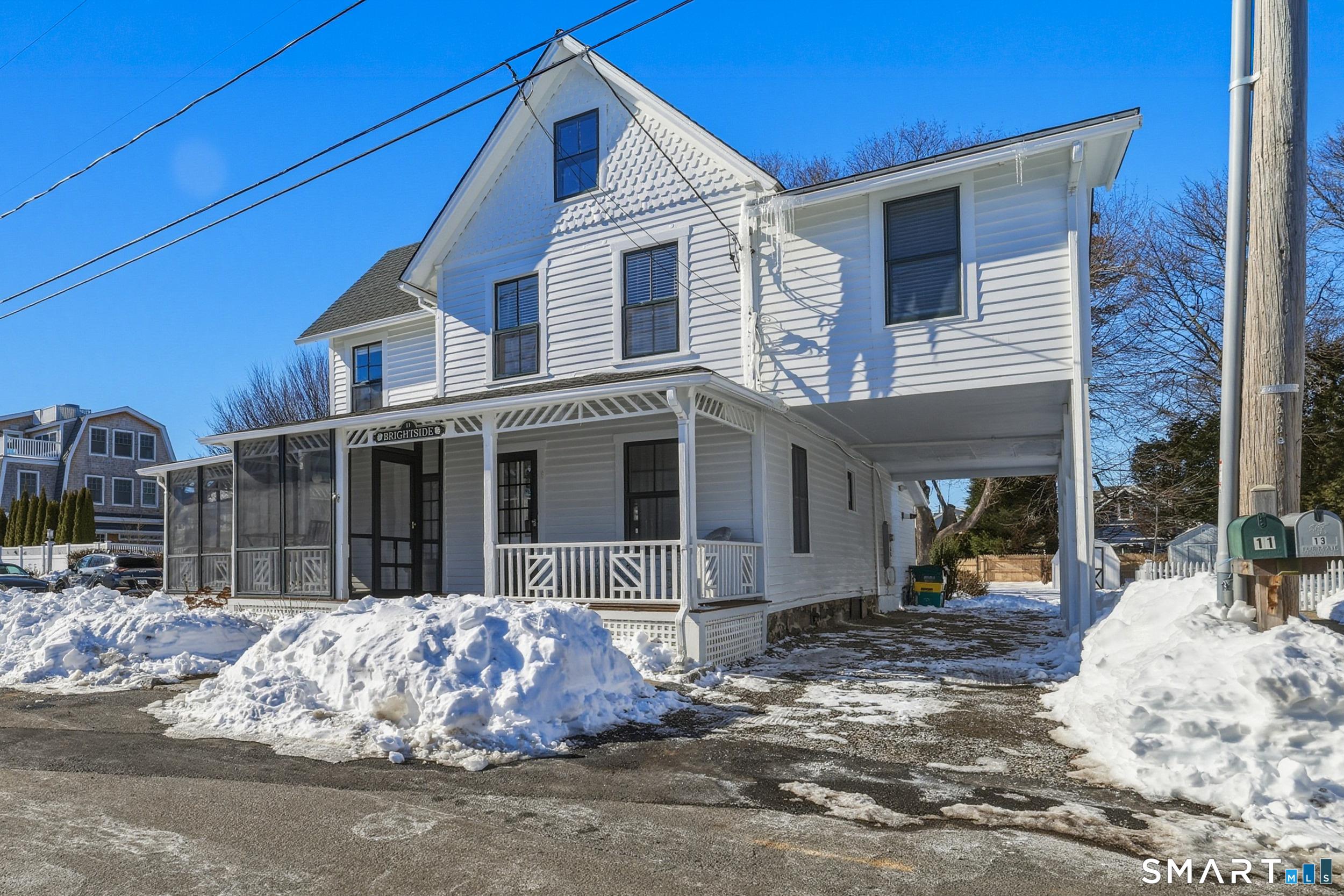 Image 3Carport: Covered carport with space for at least 3 cars.