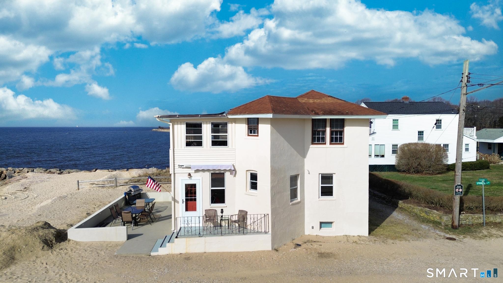 Image 3: Soak in insane ocean views from both levels of this home. You get a front-row seat to the horizon from almost every room-it's the perfect way to live the beach life from sunrise to sunset.