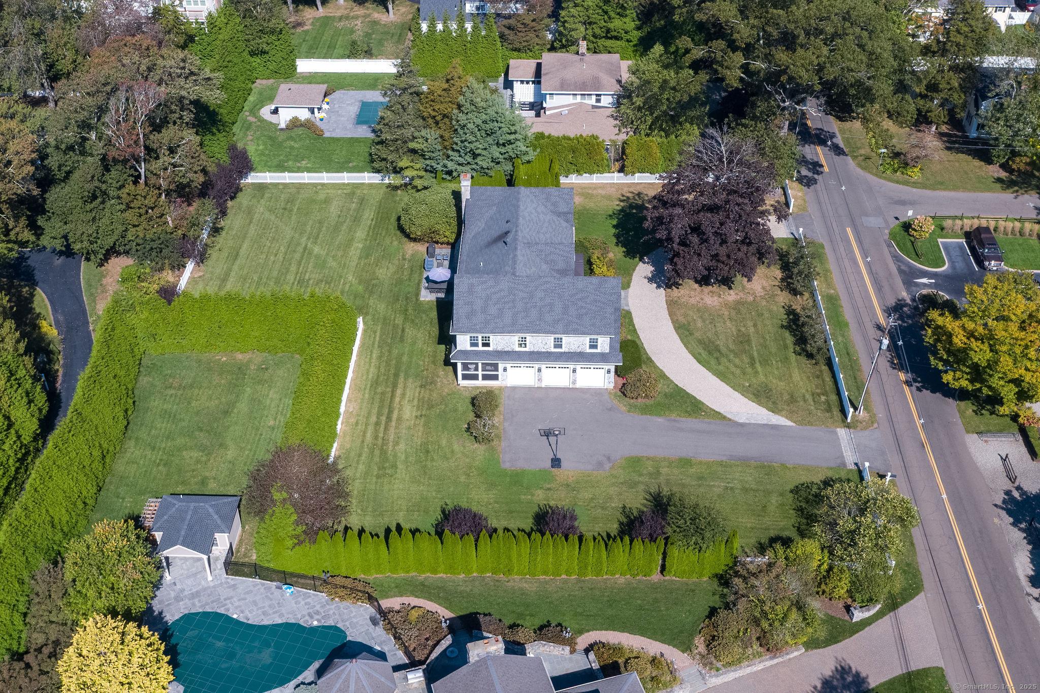 Image 3: Rarely found in this area of Madison and south of Route 1 is a very large 0.86 level lot, room for a pool.