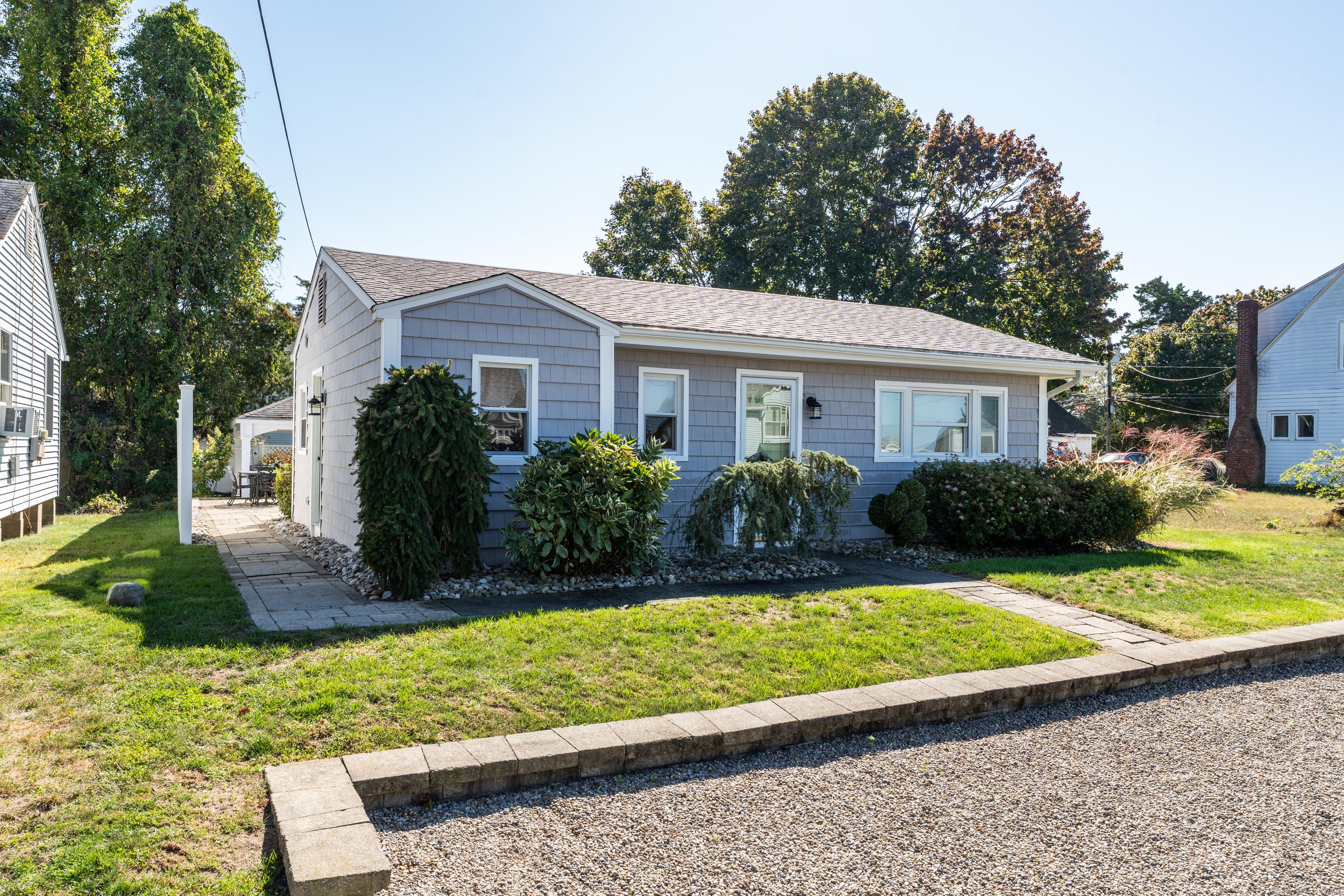 Image 1Front of House: Welcome Home to 56 Uncas Road in Harborview Association in Clinton!