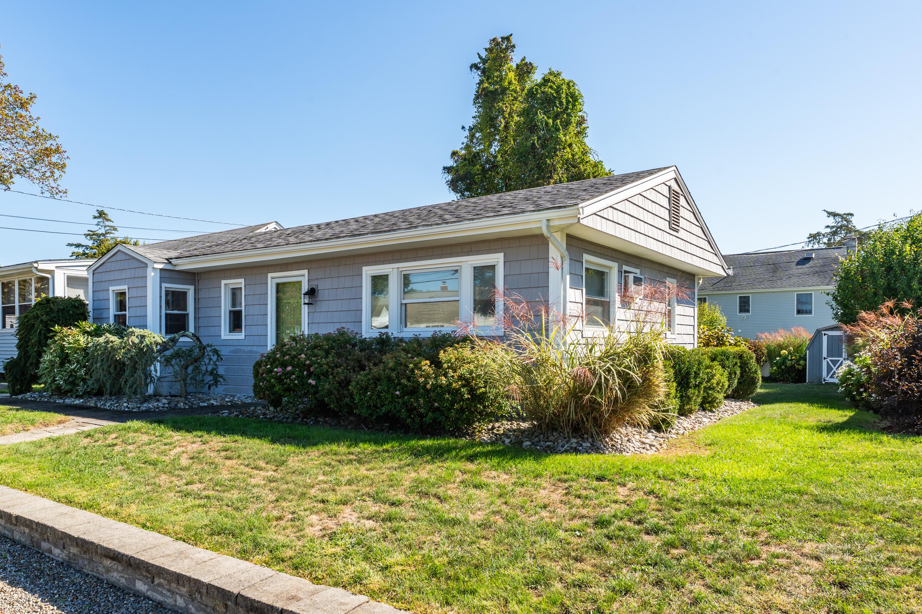 Image 3Front of House: Vinyl Shakes with newer windows and roof..