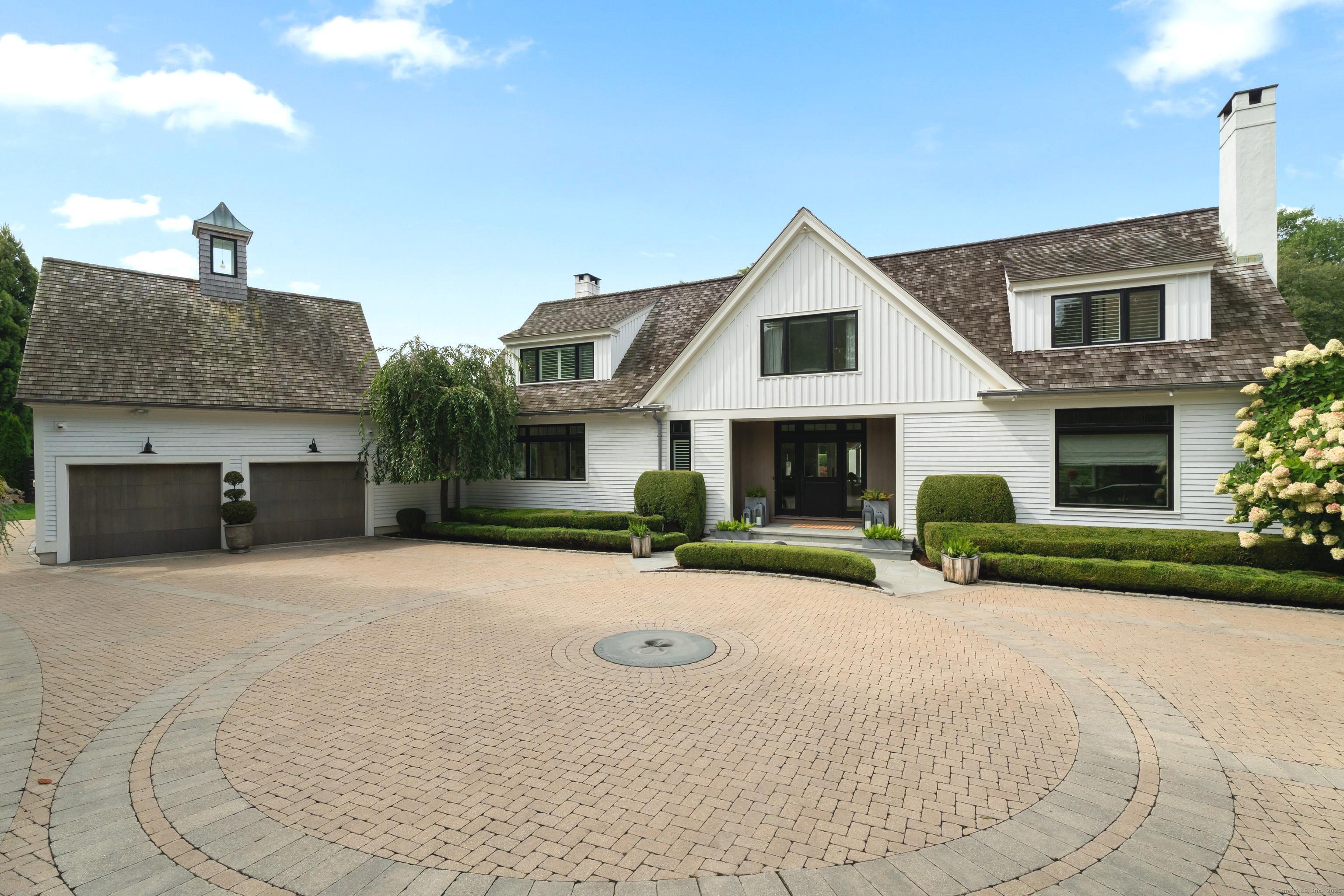 Image 1Front of House: Architectural Modern Farm House