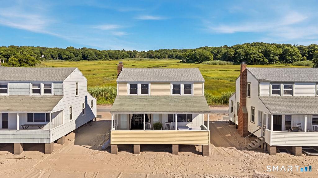 Image 3: Charming quintessential New England beach cottage.